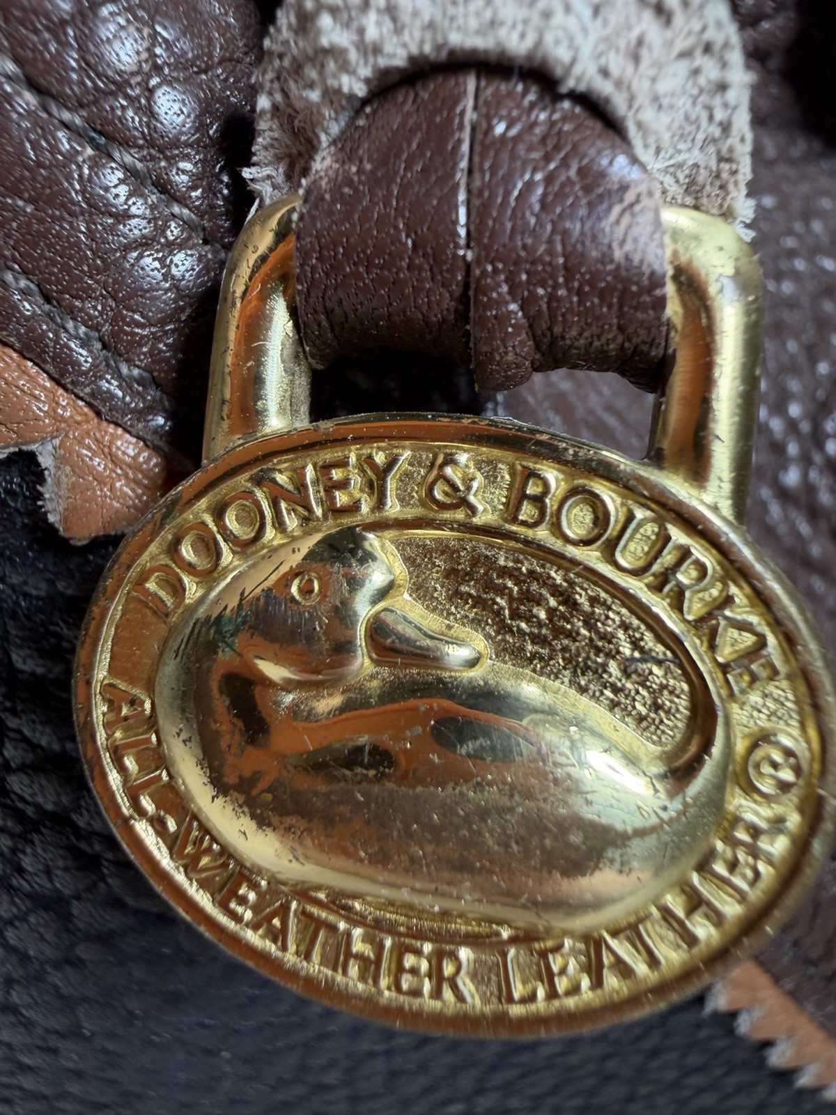 Vintage Dooney & Bourke Black Brown Pebbled Leather Drawstring Backpack Tassels