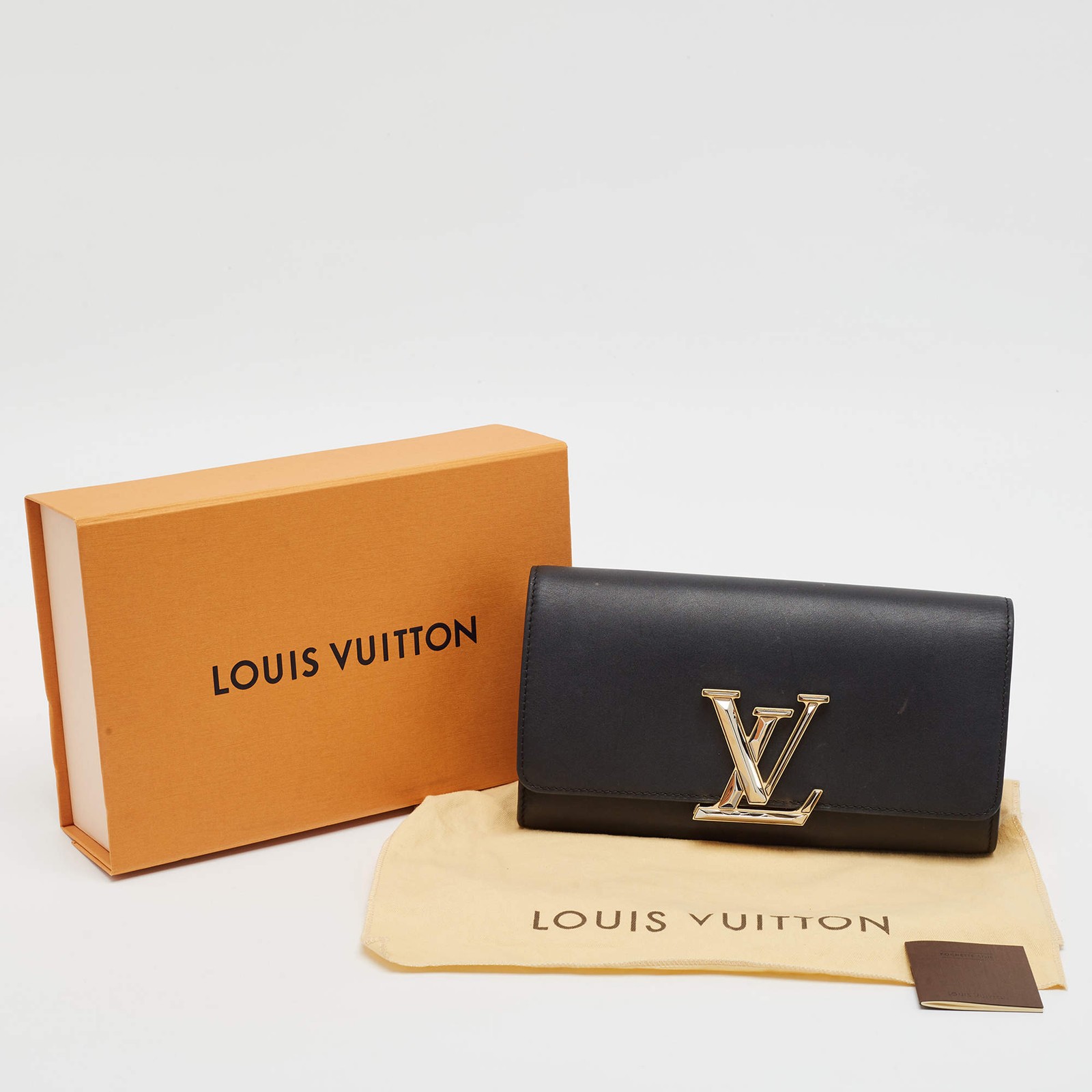 Louis Vuitton Louise Black Leather Clutch