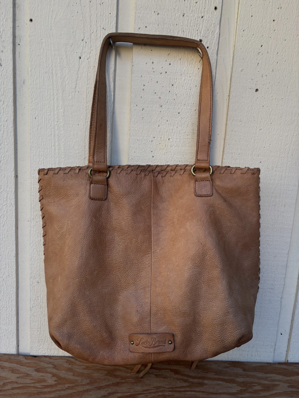 Lucky Brand genuine leather tote shoulder bag in a tan/cognac color