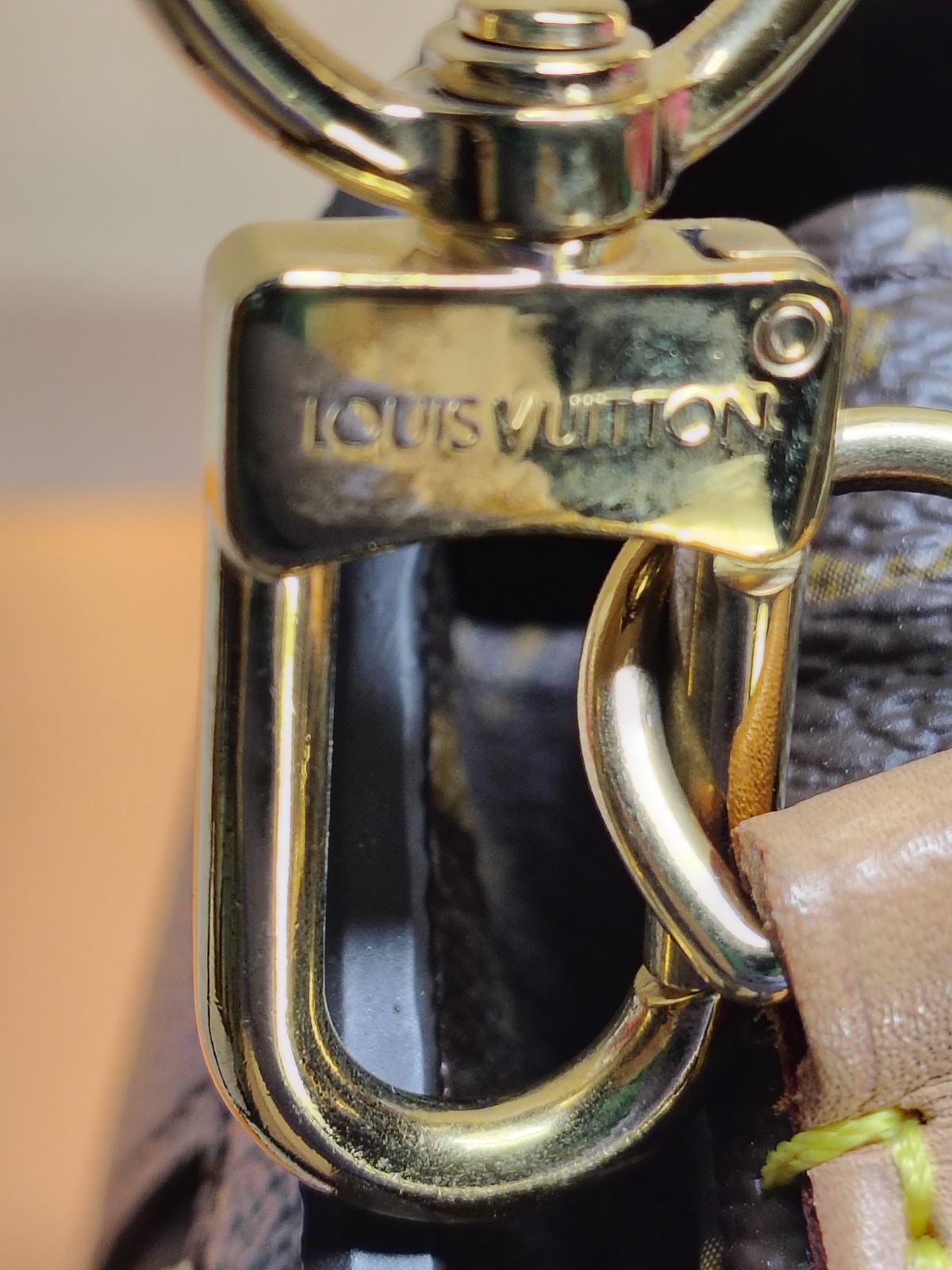 Louis Vuitton Pochette Metis, classic Monogram canvas, polished gold tone S lock