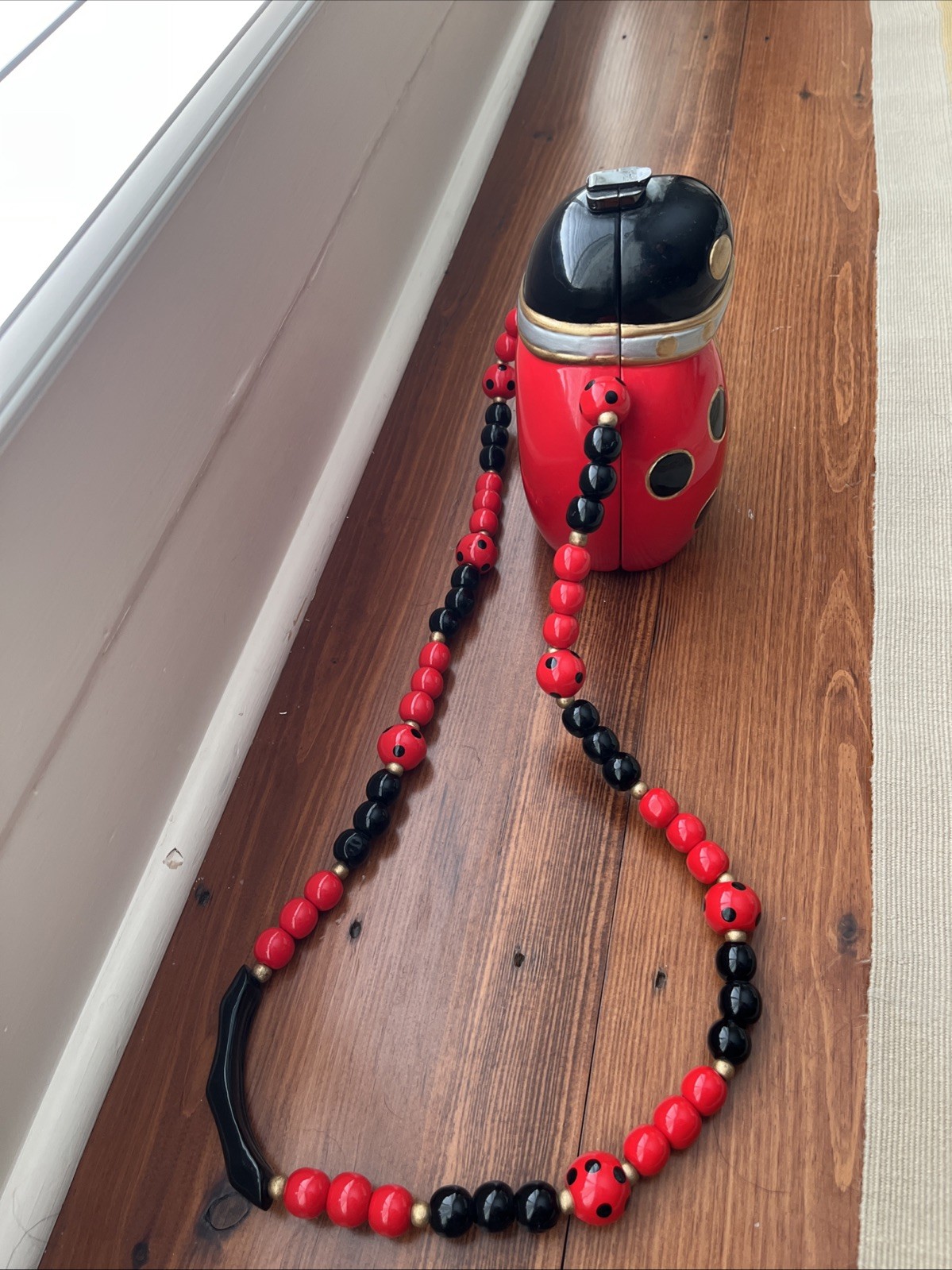 LADY BUG TIMMY WOODS Beverly Hills Carved Acacia Wood Handbag