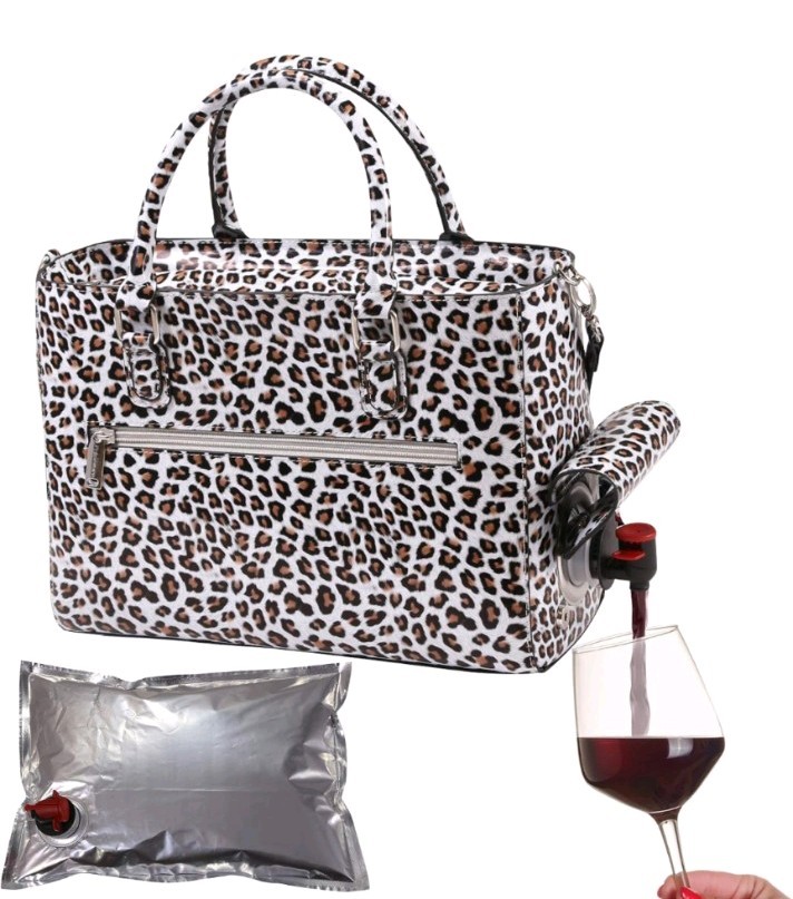 Primeware insulated drink purse features a fashionable white cheetah print