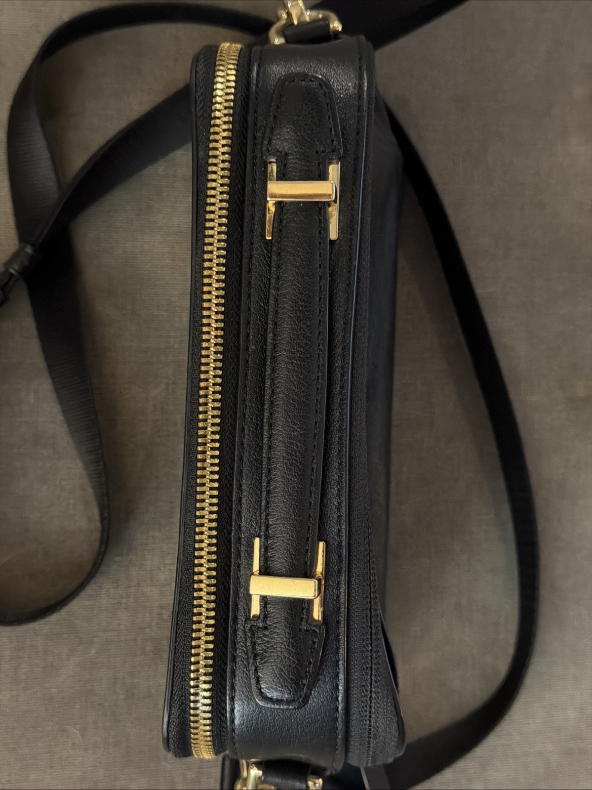 TUMI Black Solid Crossbody Bag Zip Closure Gold Hardware Detachable Strap