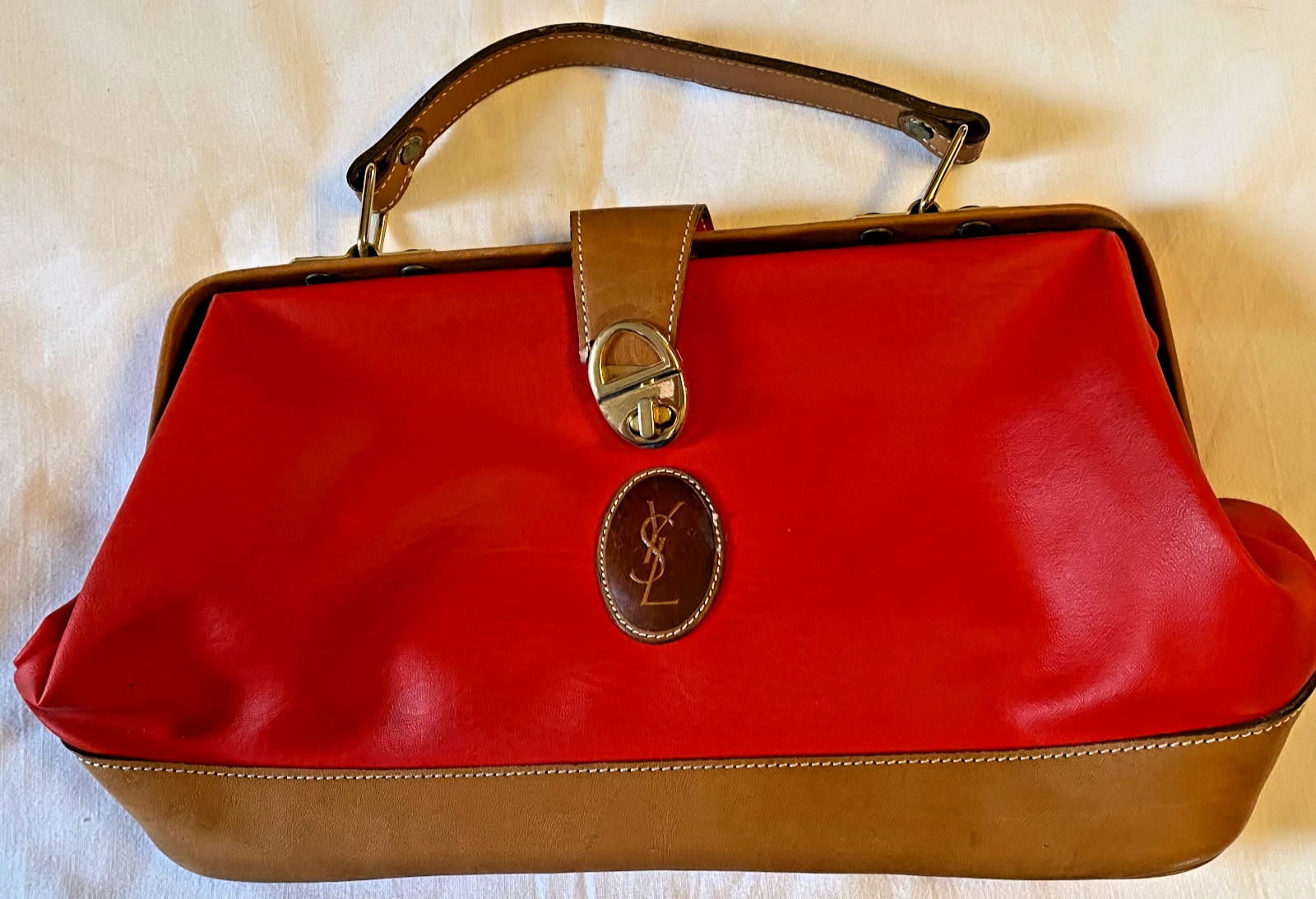 Yves Saint Laurent (YSL) Red &Tan Leather handbag for repair