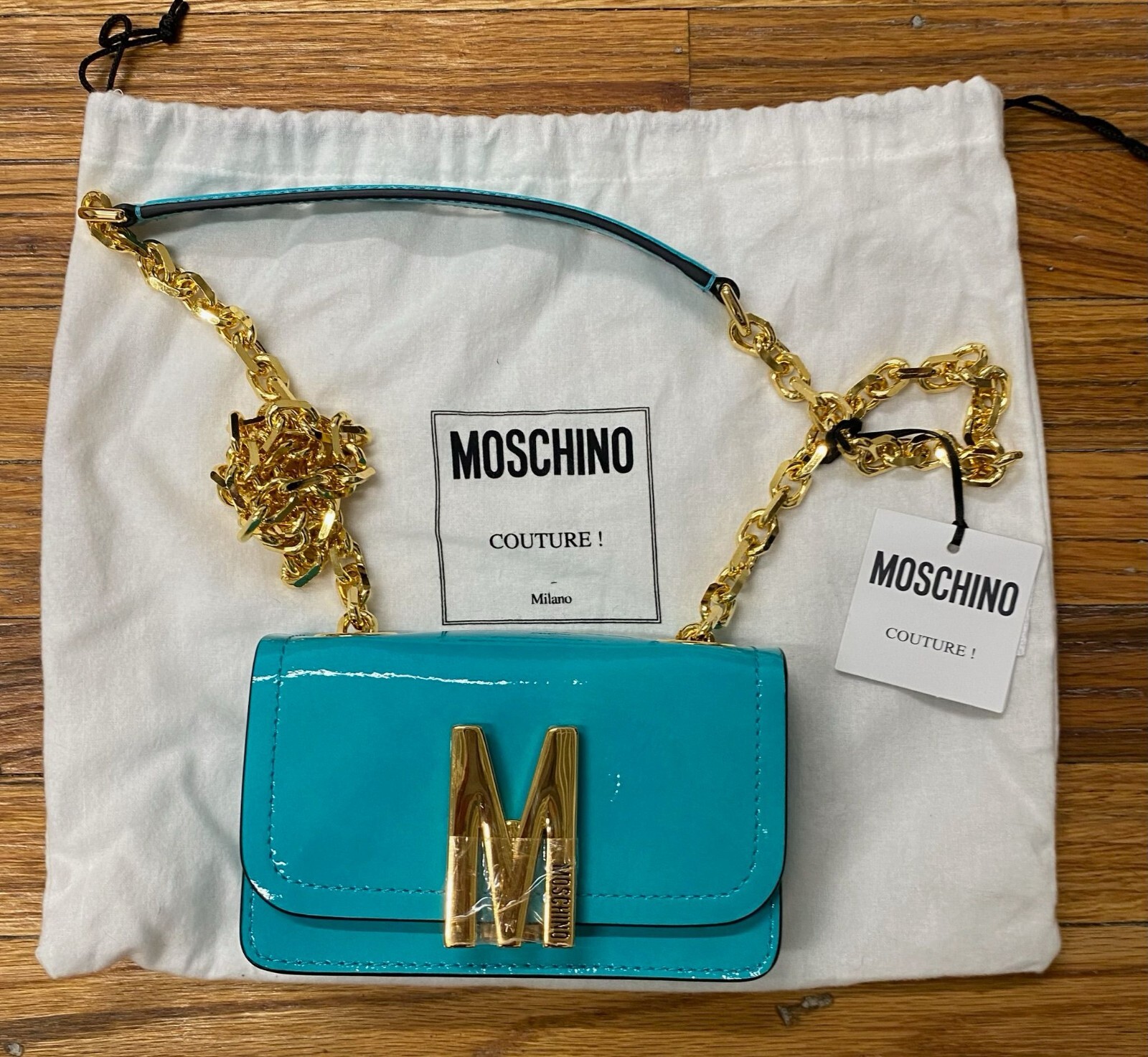 AW22 MOSCHINO Couture Jeremy Scott “M” Turquoise Metallic Patent Leather Bag