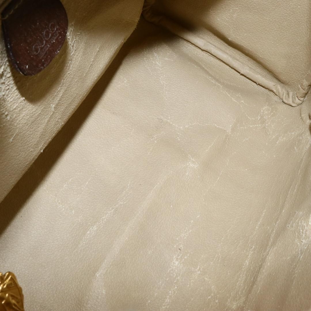 Gucci PVC canvas leather handbag, brown.