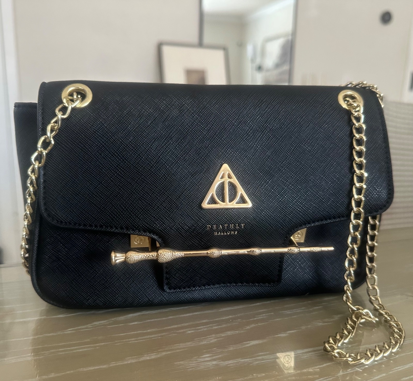 Loungefly Harry Potter Deathly Hallows Wand Crossbody Bag – BoxLunch Exclusive