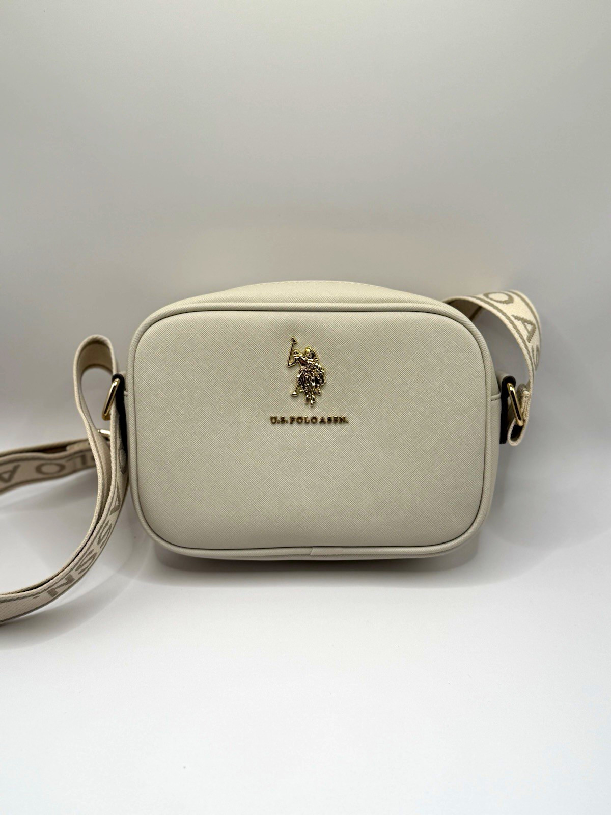 U.S. Polo Assn. Beige Small Logo Crossbody Bag Zip Closure Gold Hardware Strap