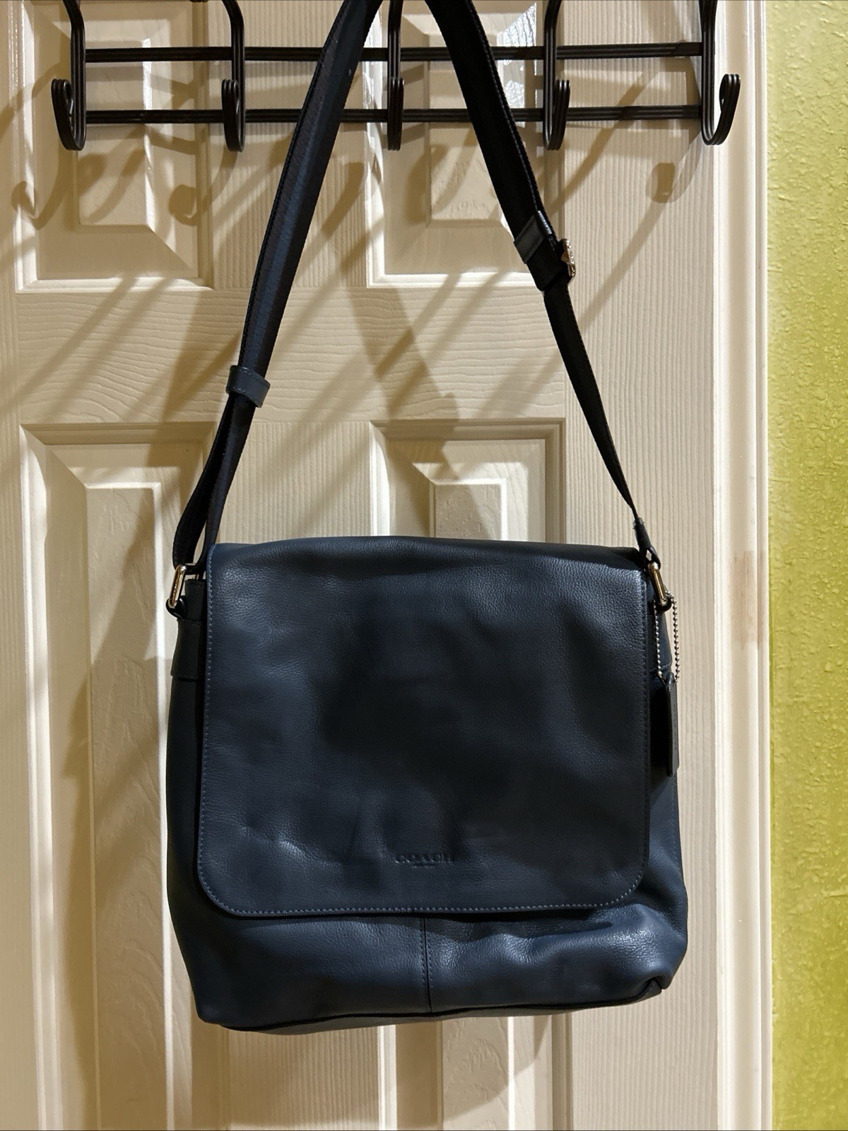 Coach Charles Messenger Bag in a deep blue leather.