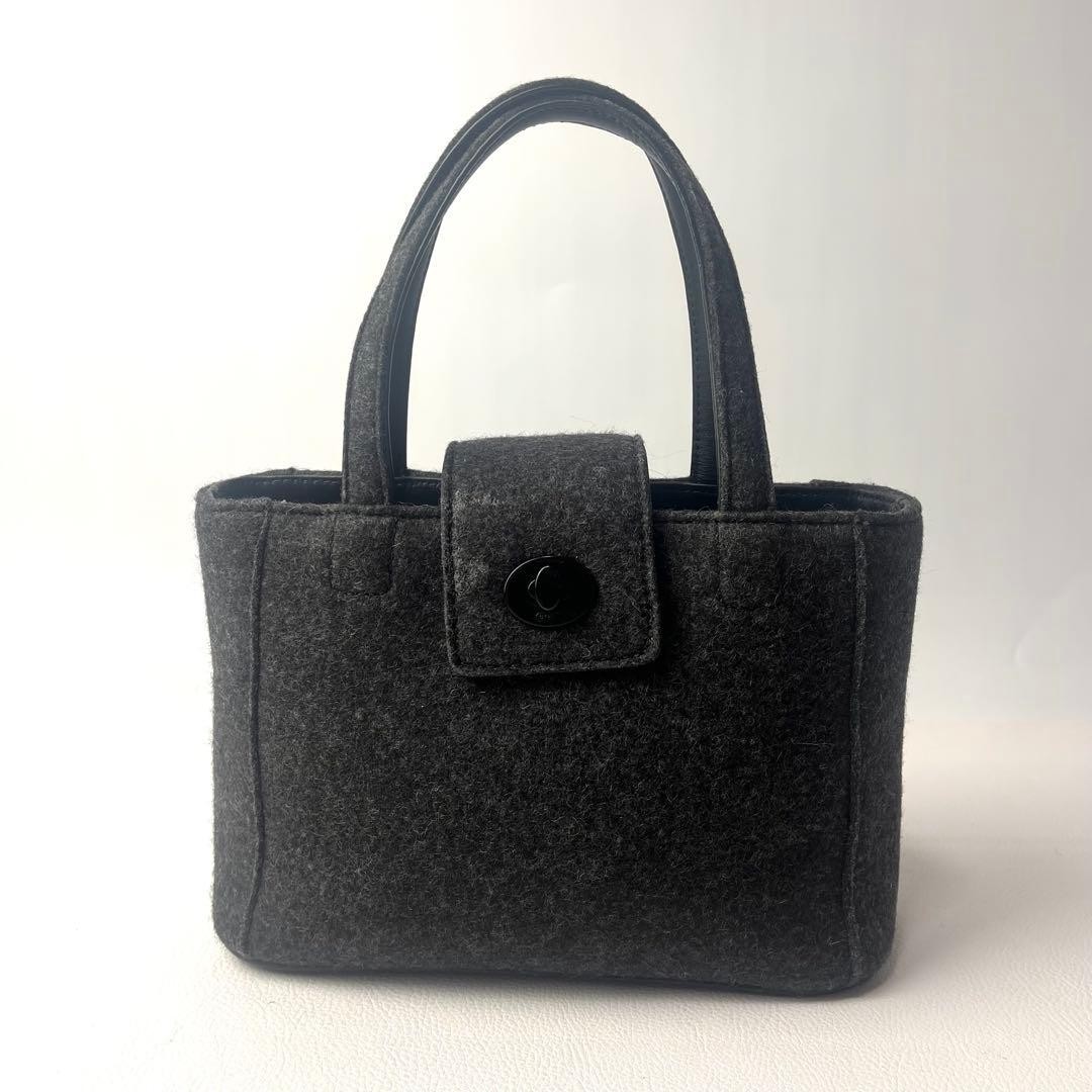 Excellent condition COACH mini handbag turn lock self standing wool gray 15a