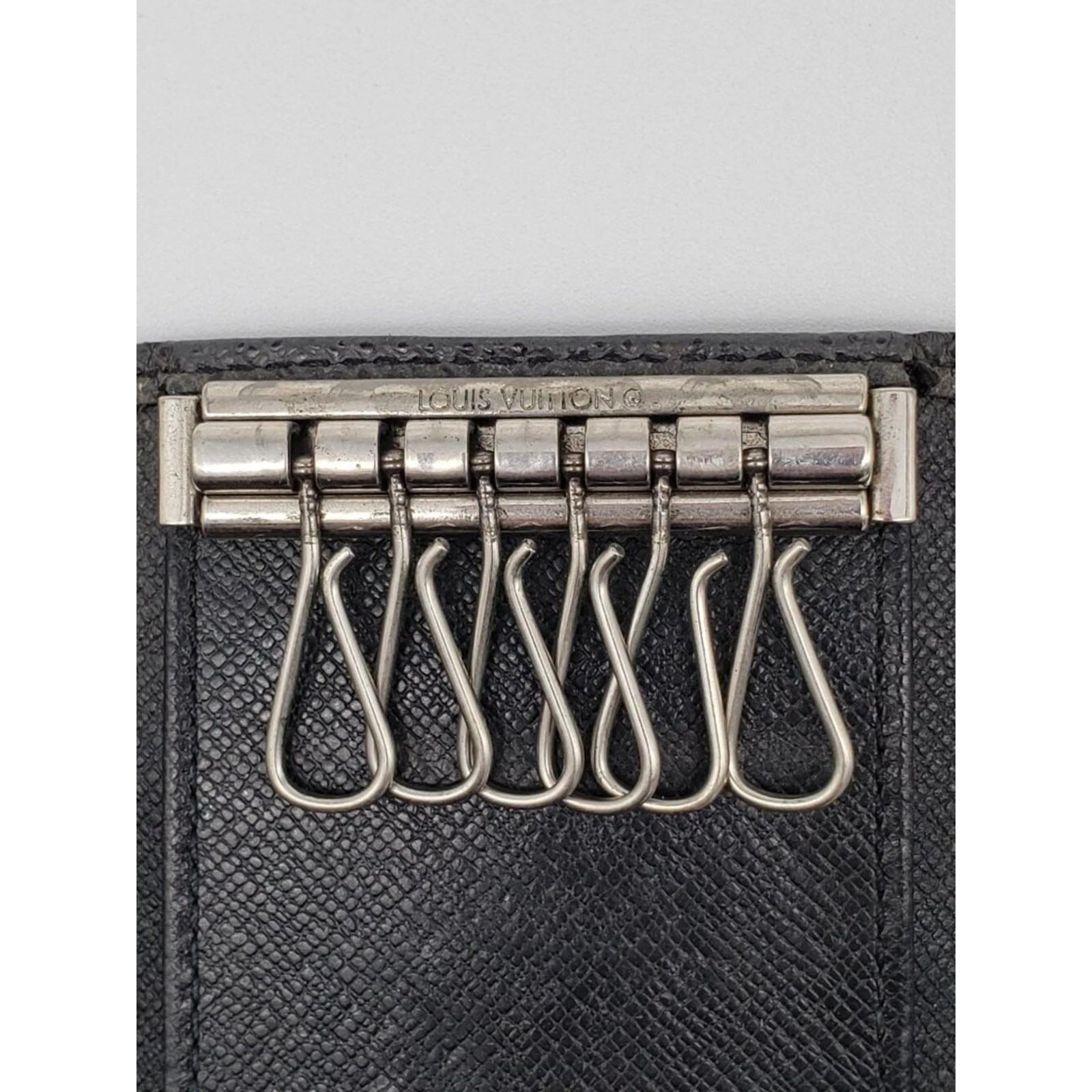 Authentic Louis Vuitton 6-Key Holder – Black Leather – Silver Hardware