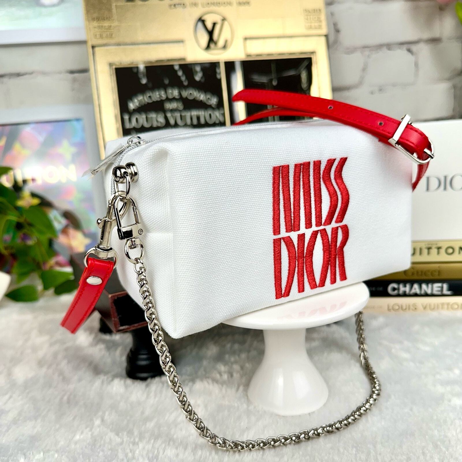 MISS DIOR Beauty line canvas crossbody bag with strap and chain.