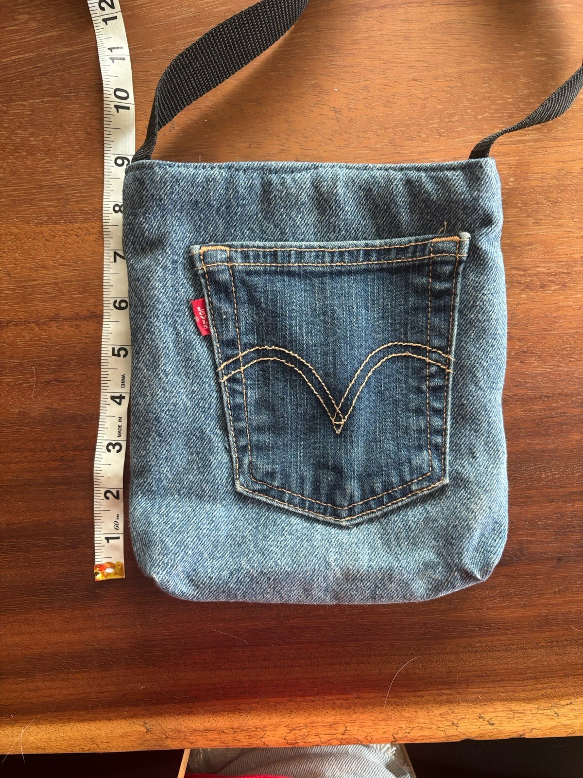 Custom made Levi’s denim crossbody bag (includes pockets inside and out)