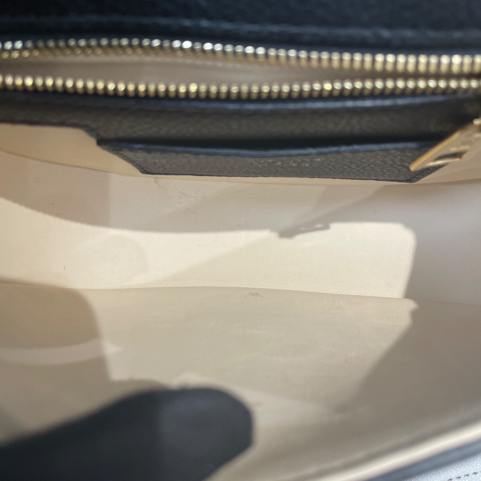 Louis Vuitton Pont 9 black calfskin crossbody bag with gold-tone hardware.