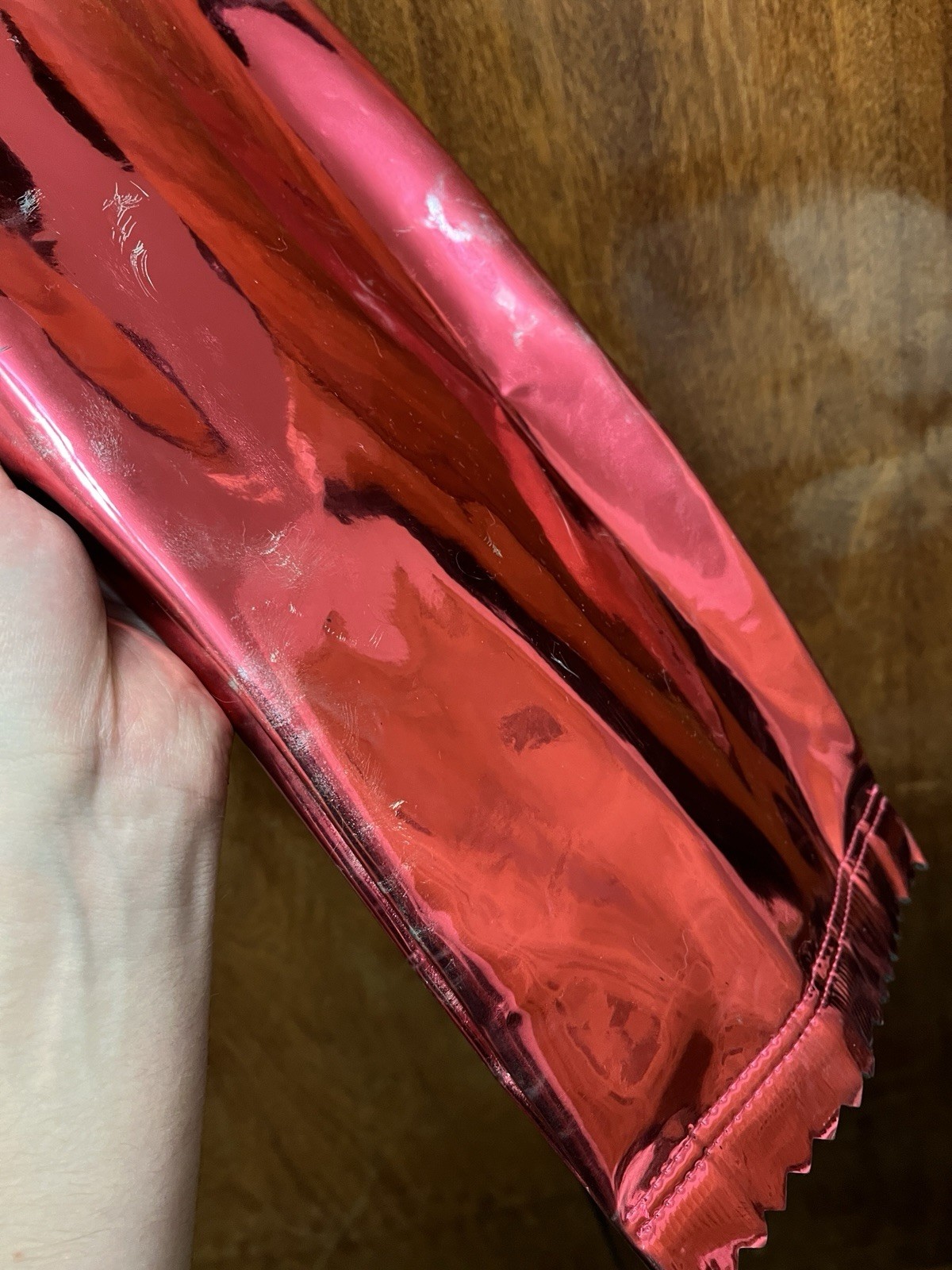 The iconic pink Maison Martin Margiela x H&M clutch shaped like a candy wrapper