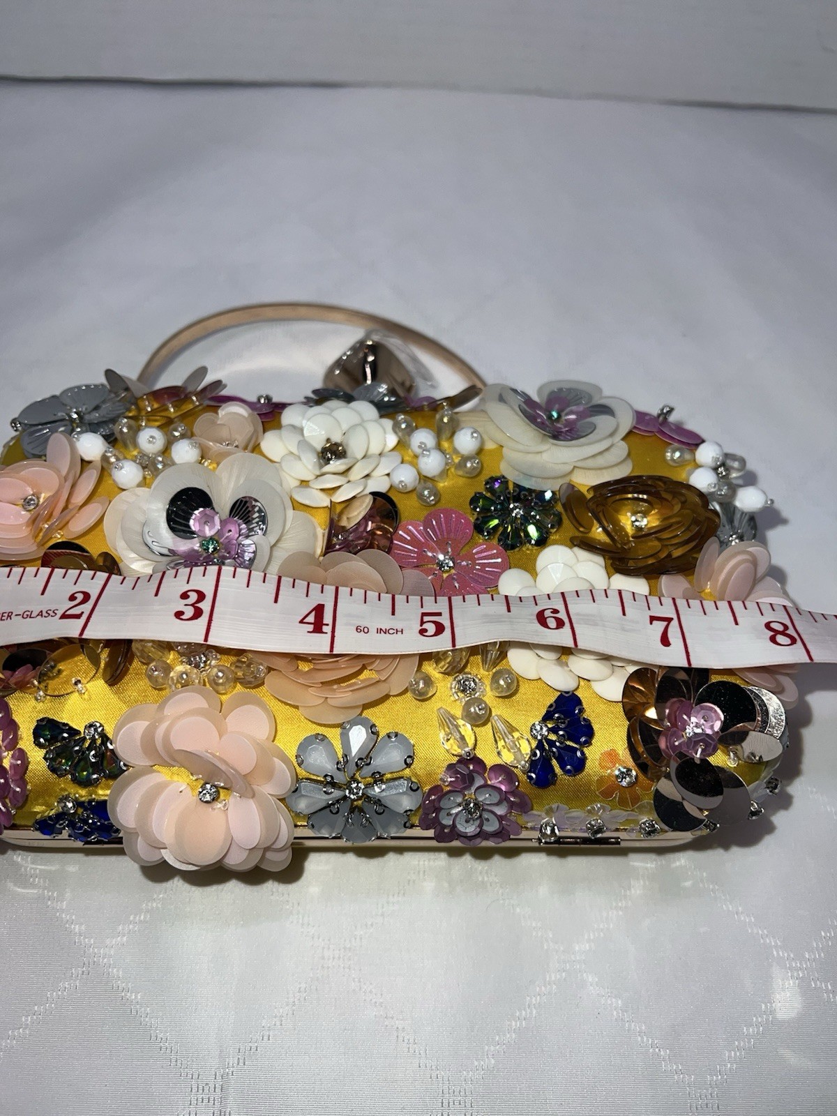 Bebe Daisy Chain Crossbody Clutch. Size: Wx8”, Hx5.9”, Dx1.9” NWT