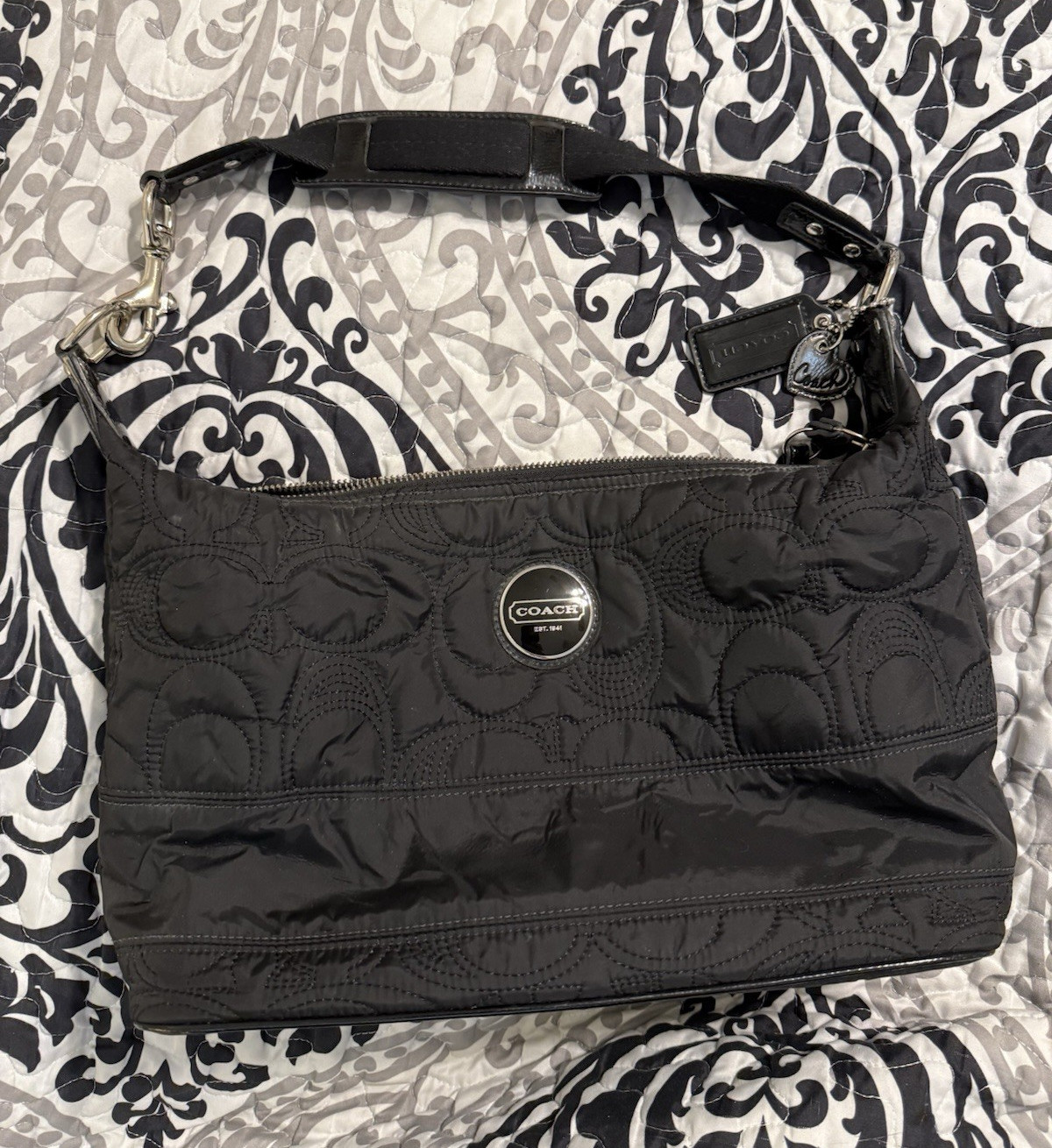 Coach Black Quilted Shoulder Bag Zip Closure Blue Lining Inner Pockets Charm