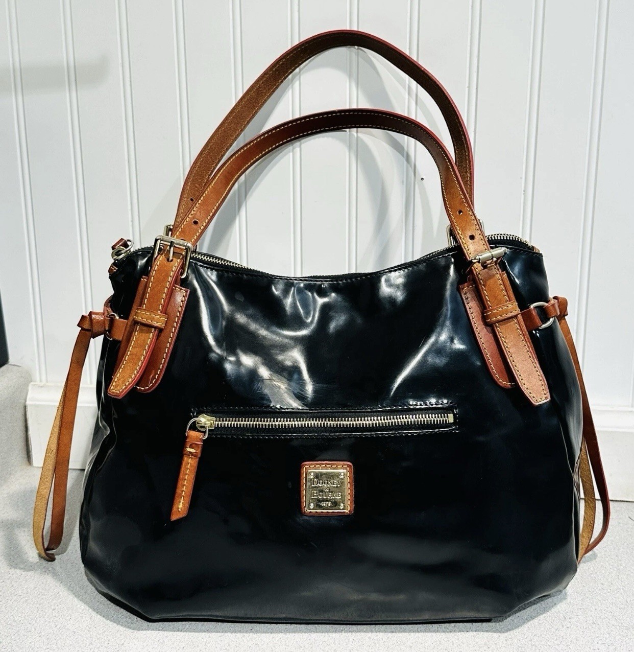 Dooney & Bourke Nina Large Black Patent Leather Satchel With Brown Leather Trim