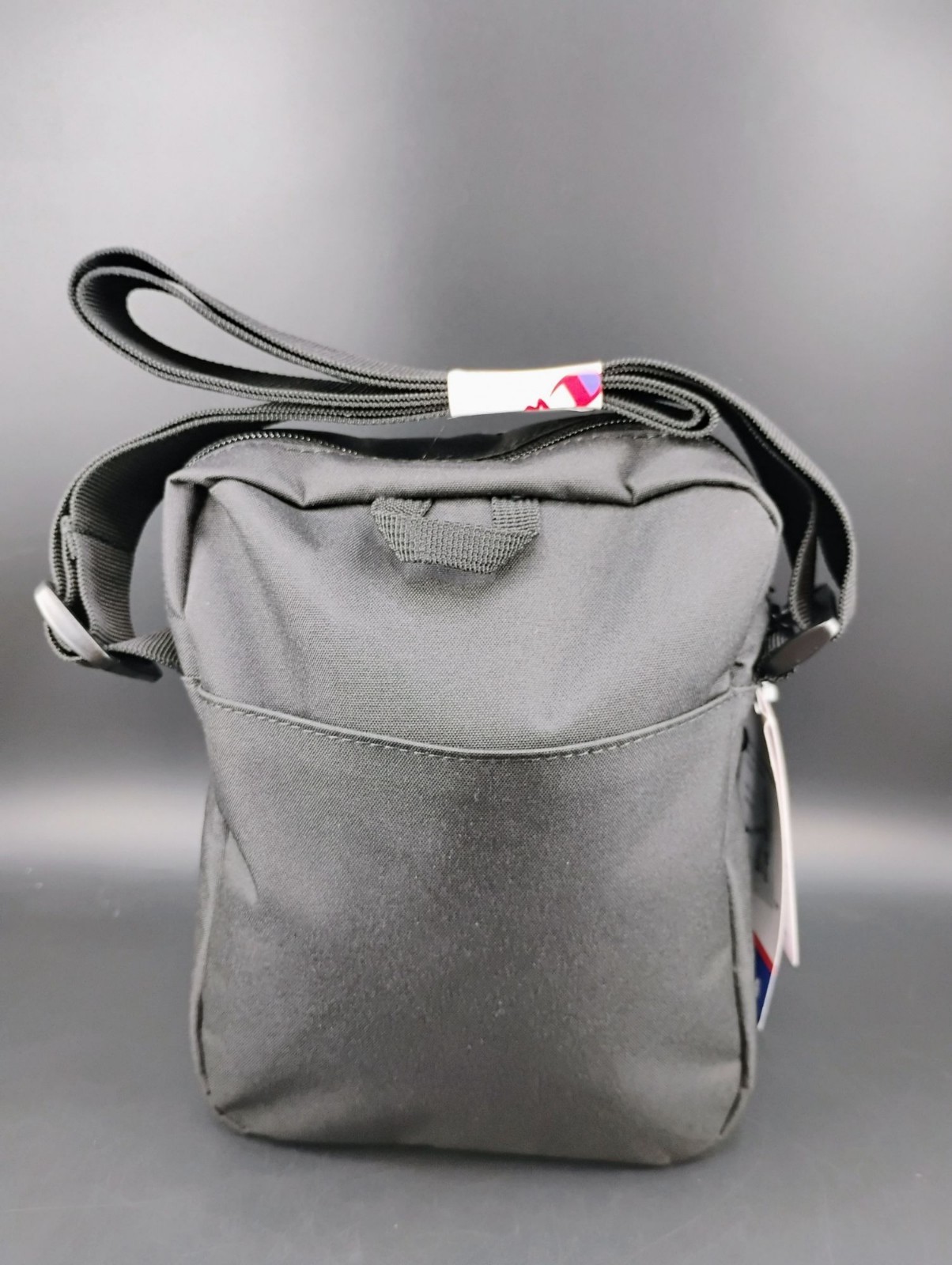 Champion Logo Black Crossbody Bag Adjustable Strap Compact Design