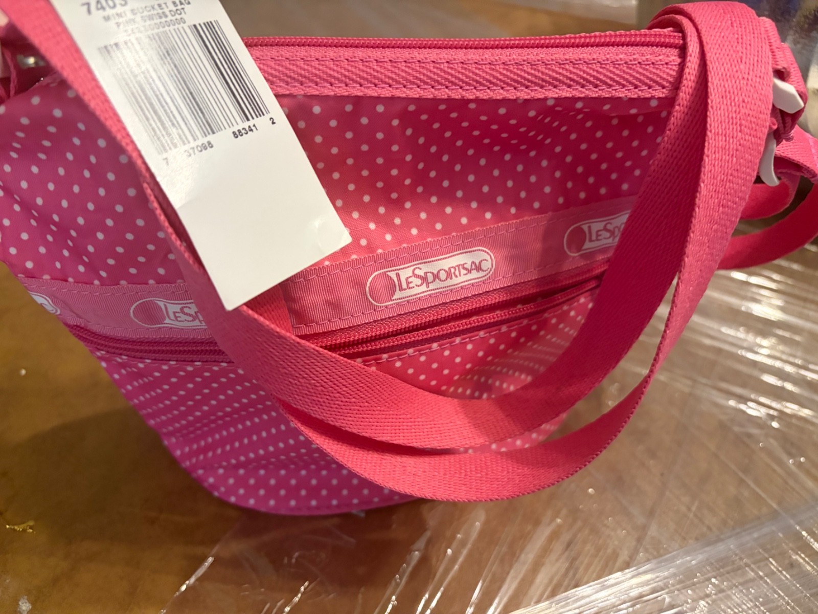 pink polka dots LaSporsac shoulder bag