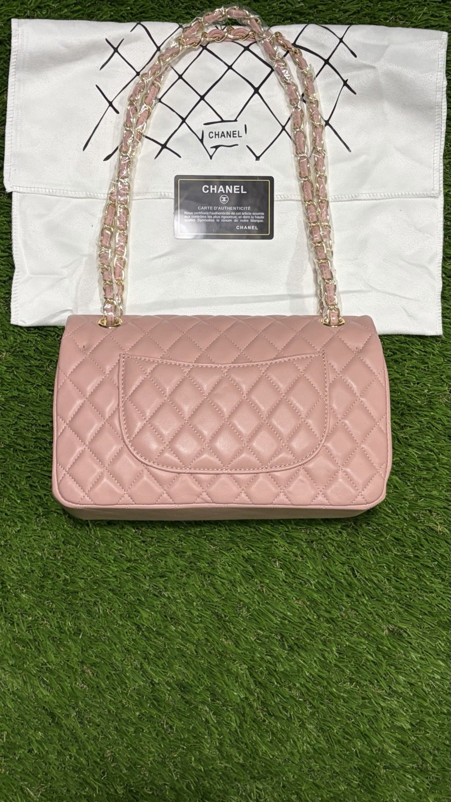 Pink quilted shoulder bag