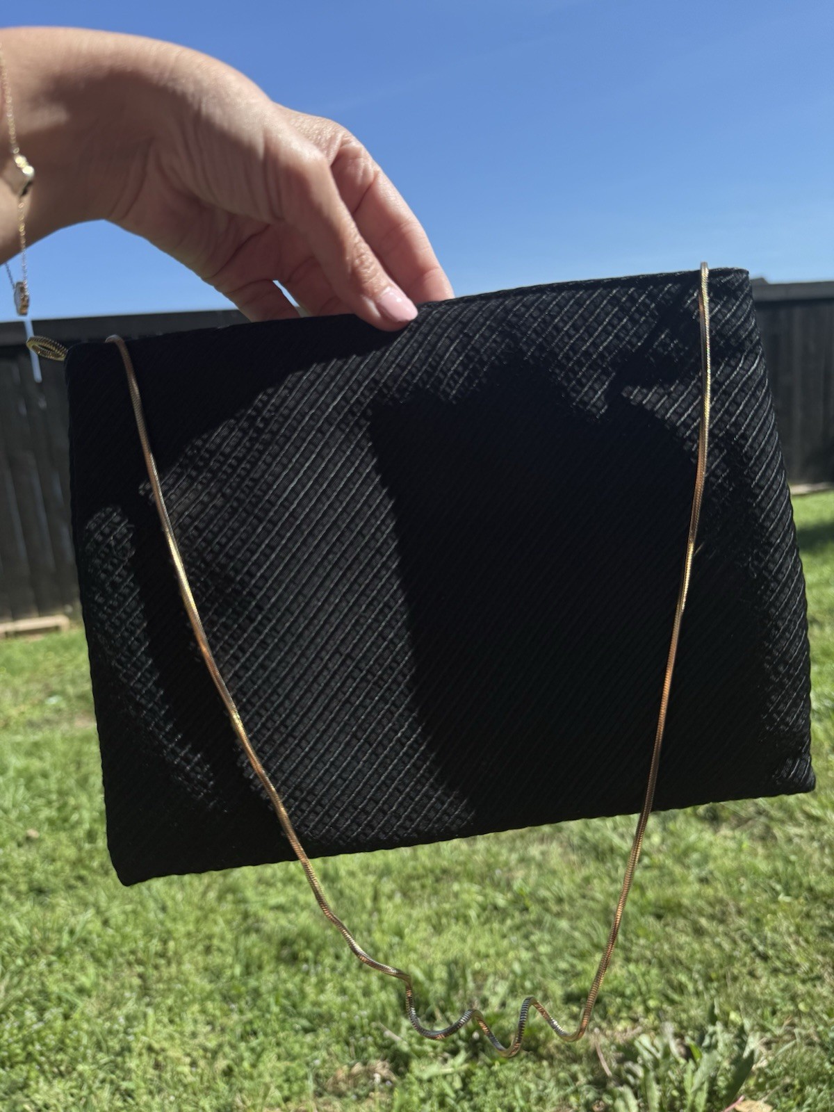 REVA Black Shoulder Bag Gold Metal Strap Diagonal Pattern Accent Women