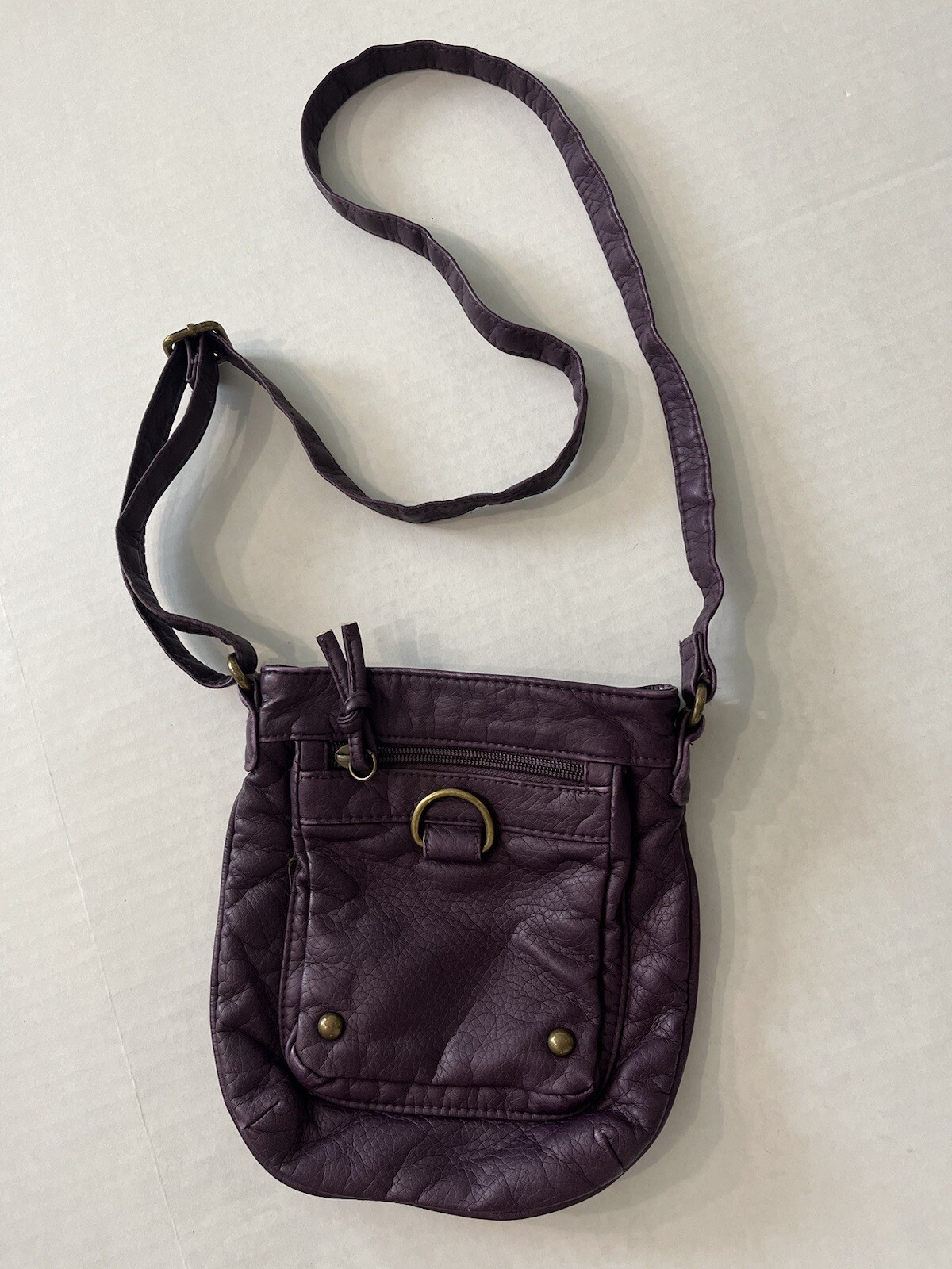 Dark Plum Cross Body Bag. Made From 100% Polyurethane Synthetic Vegan Leather. .