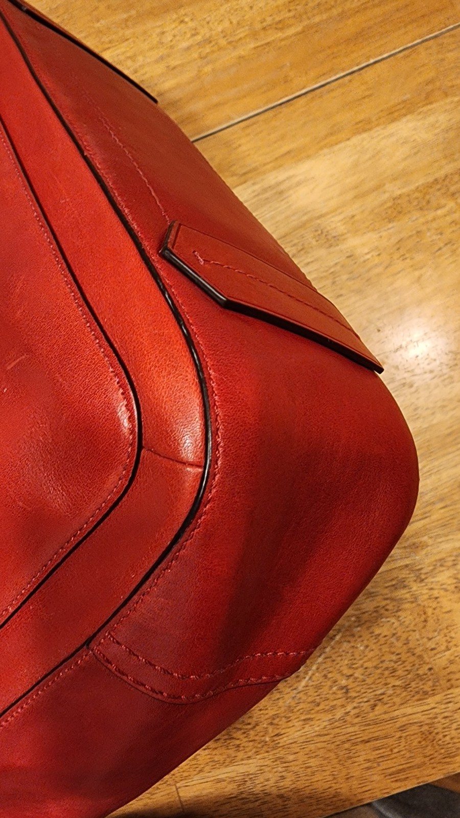 red leather Reed Krakoff Boxer Tote Bag, dual rolled handles & belt detailing.