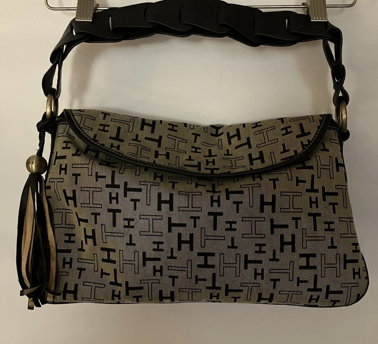 Tommy Hilfiger TH Hand Bag Purse Color Tan Black Tasseled Charm 18 Inch Strap