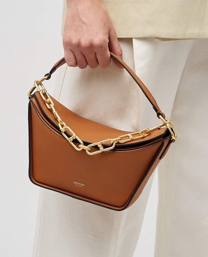 OROTON “Fable” gold chain and leather top handle handbag in cognac