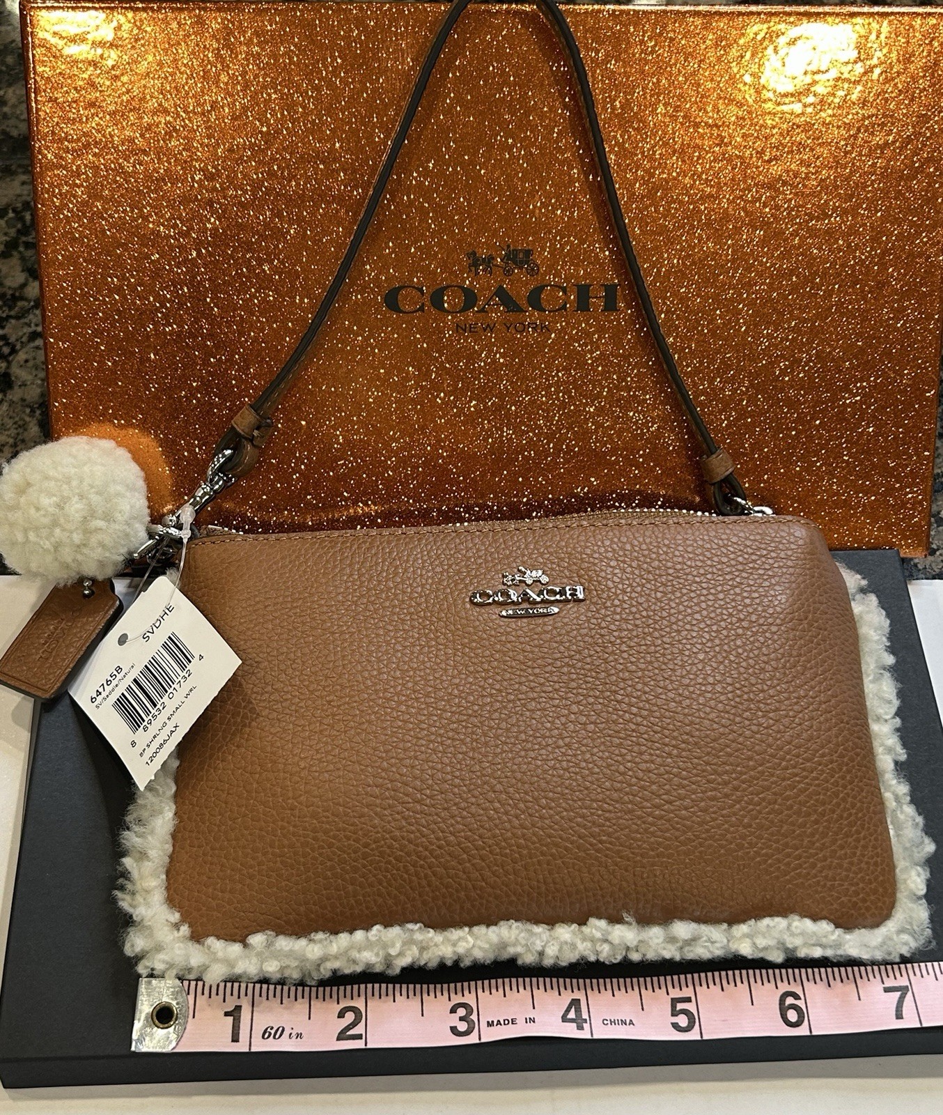 Coach Brown Pebbled Wristlet Pouch Shearling Trim Zip Wrist Strap Pompom Charm