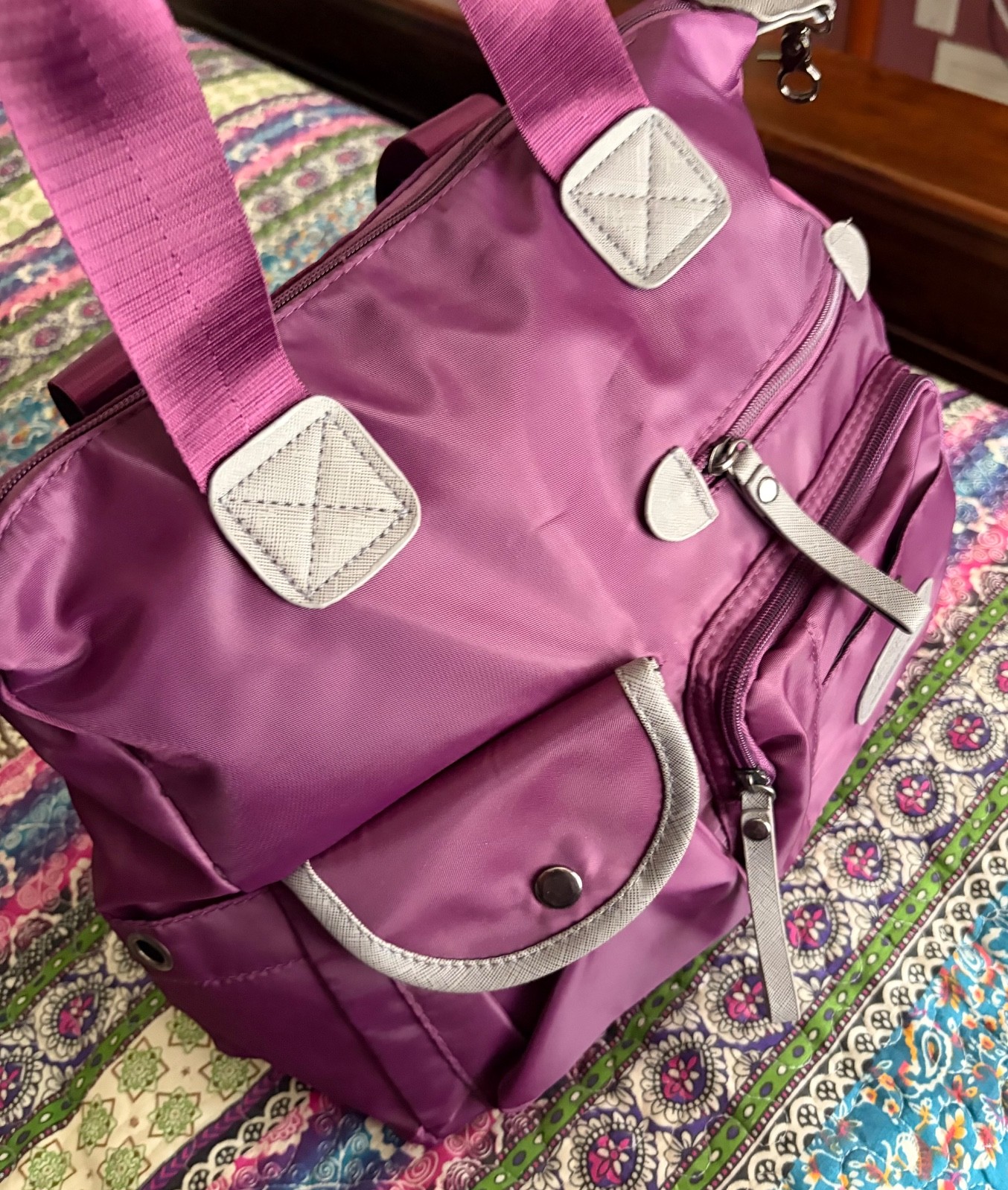 Jinpingpiju purple travel bag with many pockets and attachable strap