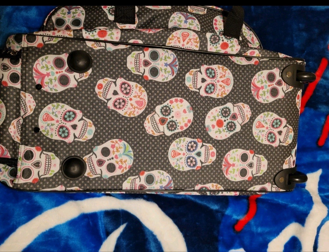 Betsey Johnson Skull Party Rolling Carry-On Bag, Skull Print, Tag & Charm