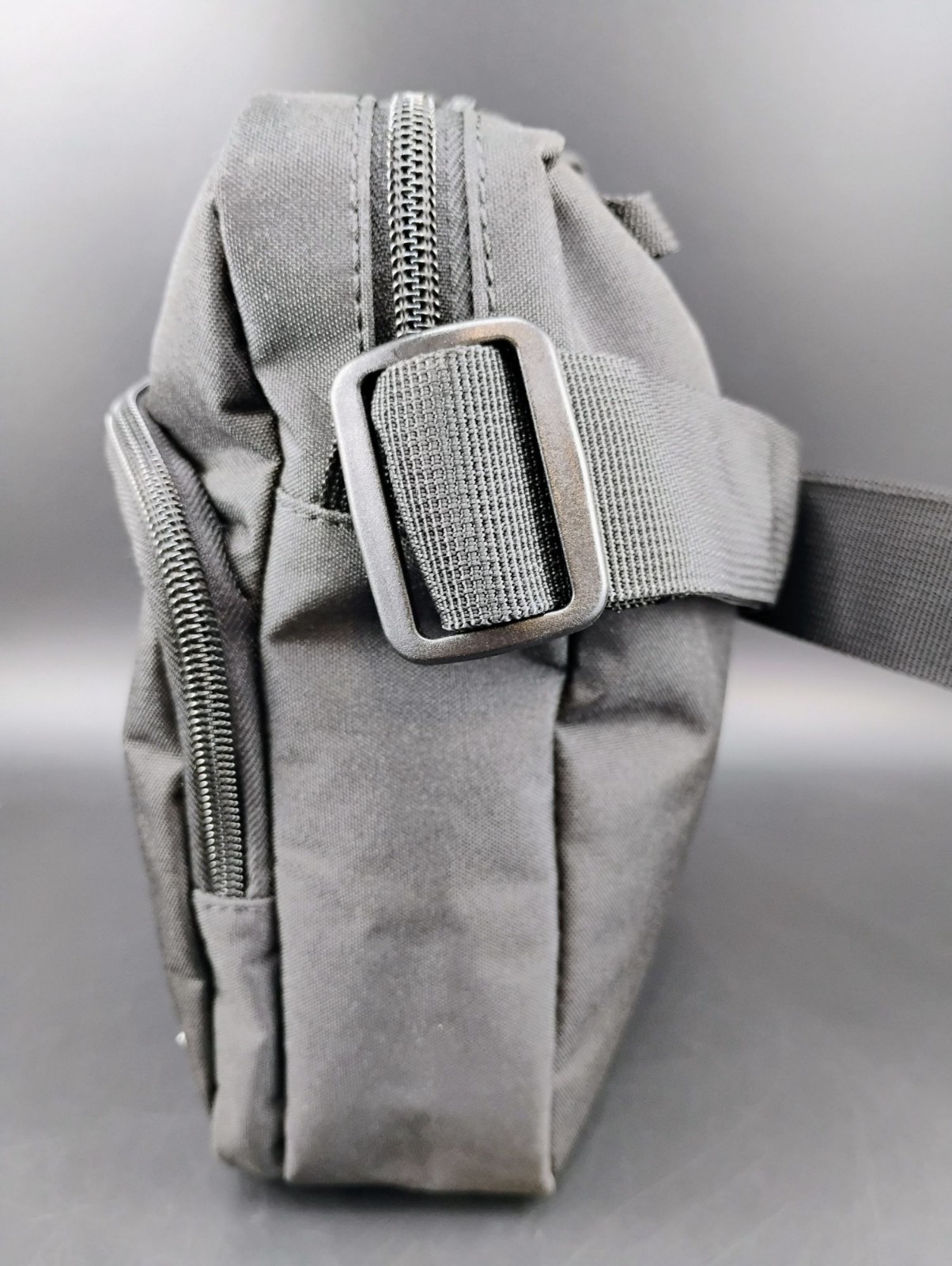Champion Logo Black Crossbody Bag Adjustable Strap Compact Design