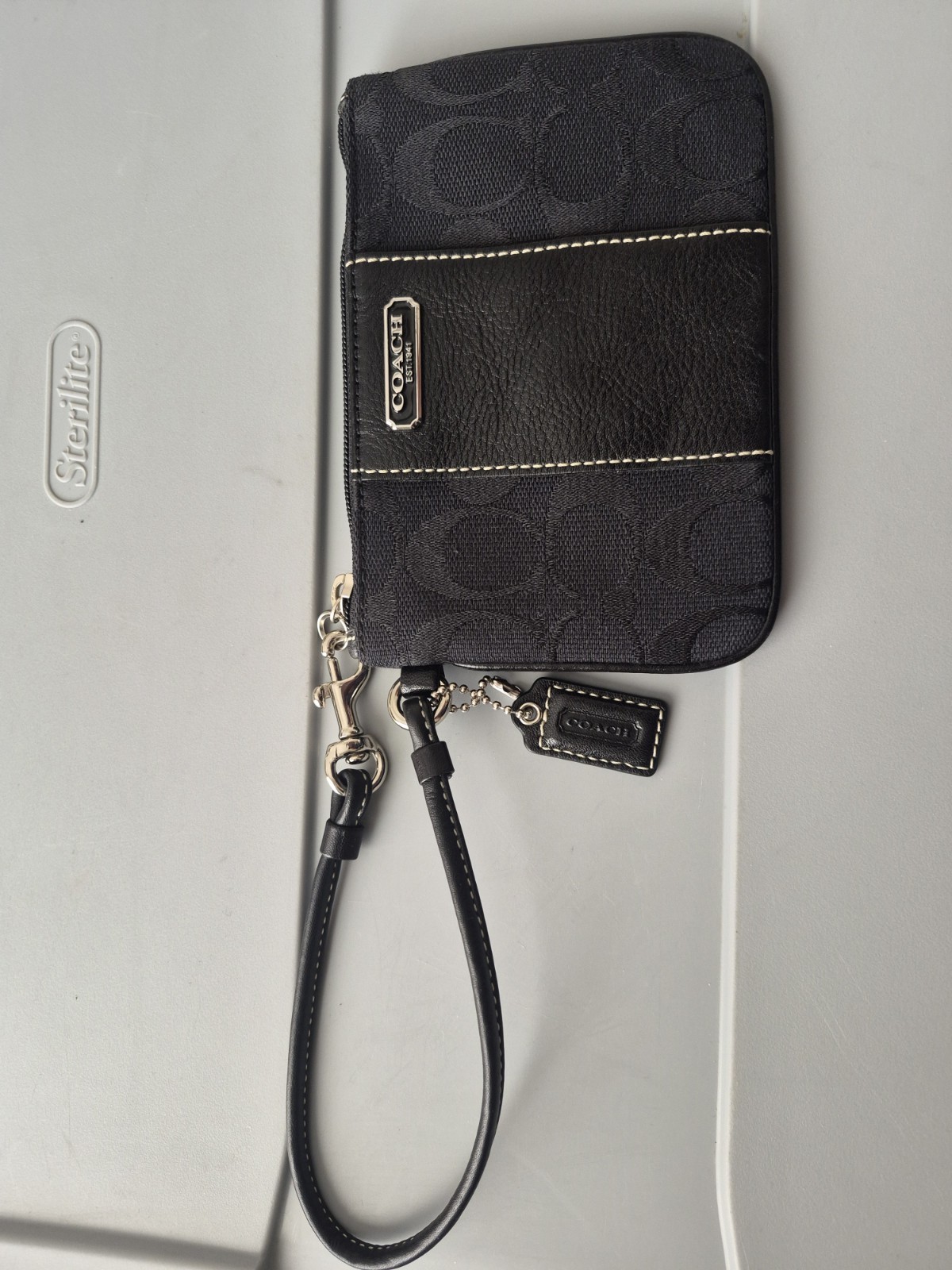 Brand new black/gray signature coach wristlet
