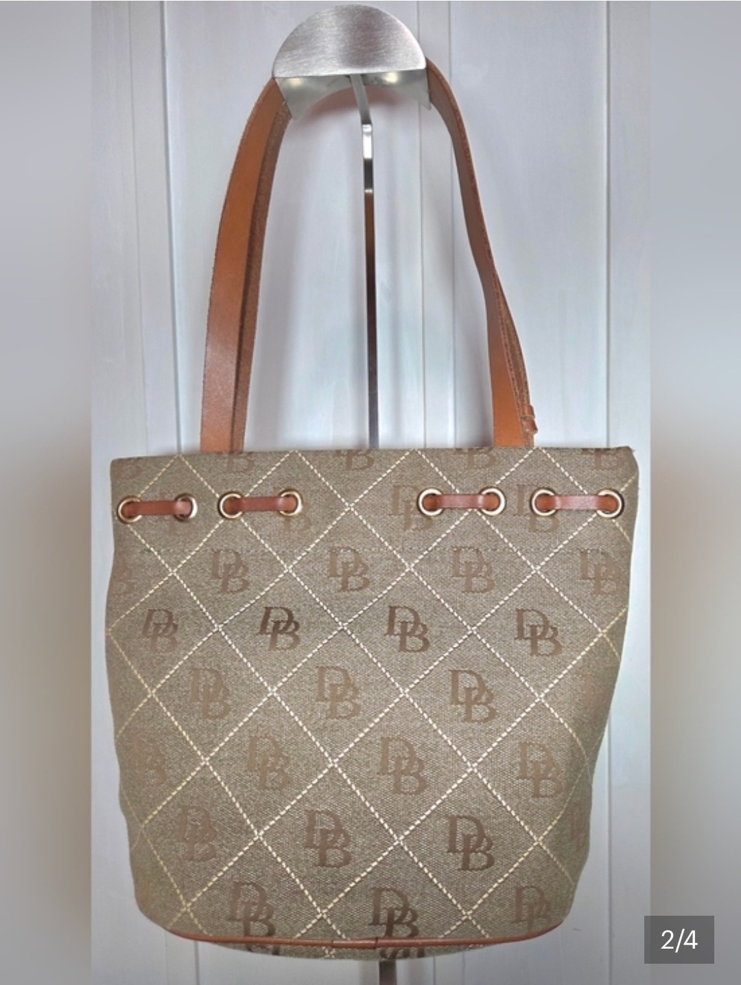 Dooney & Bourke Bags Bucket Monogram Quilt Tassel Canvas Shoulder Bag, Brown