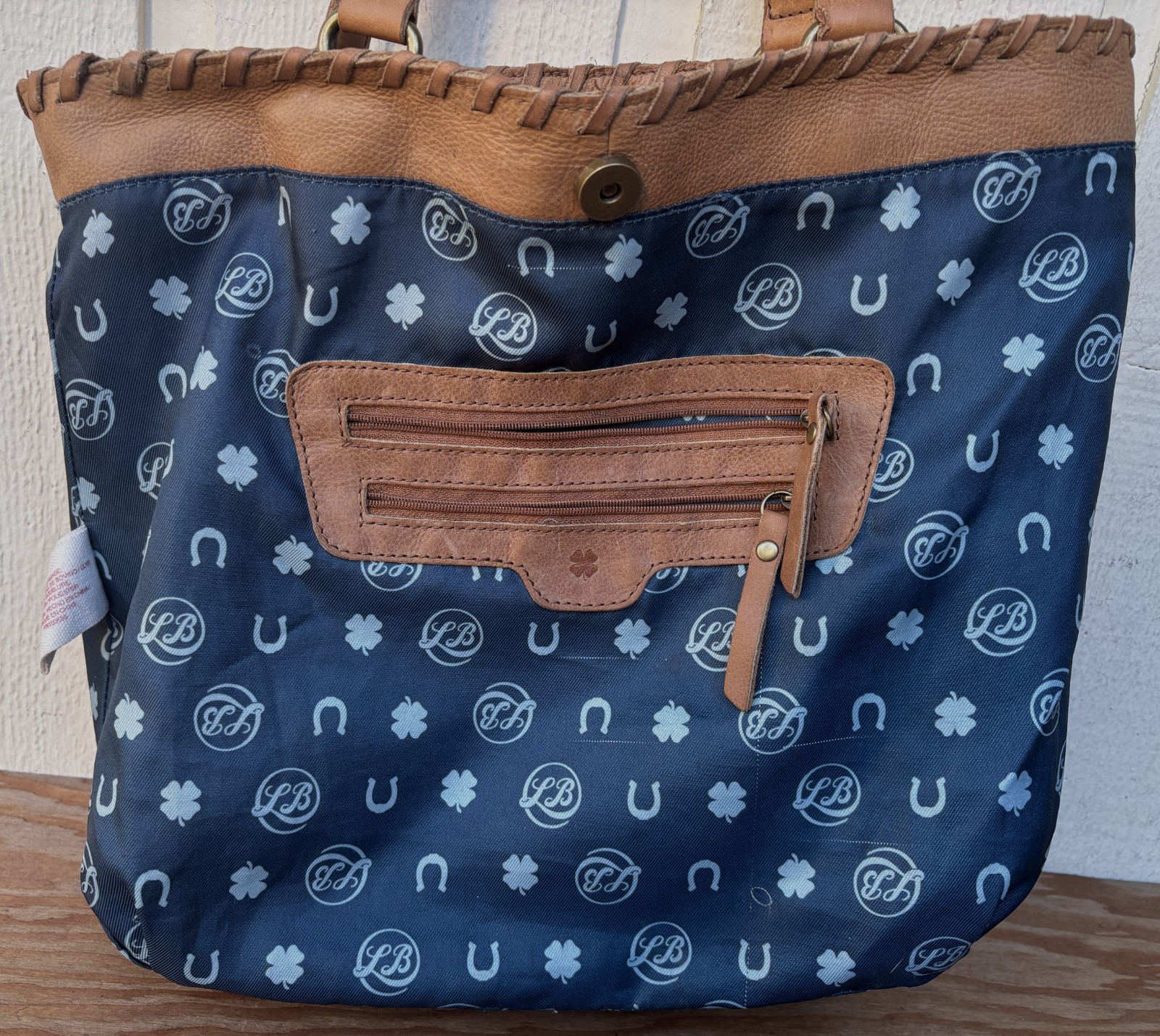 Lucky Brand genuine leather tote shoulder bag in a tan/cognac color