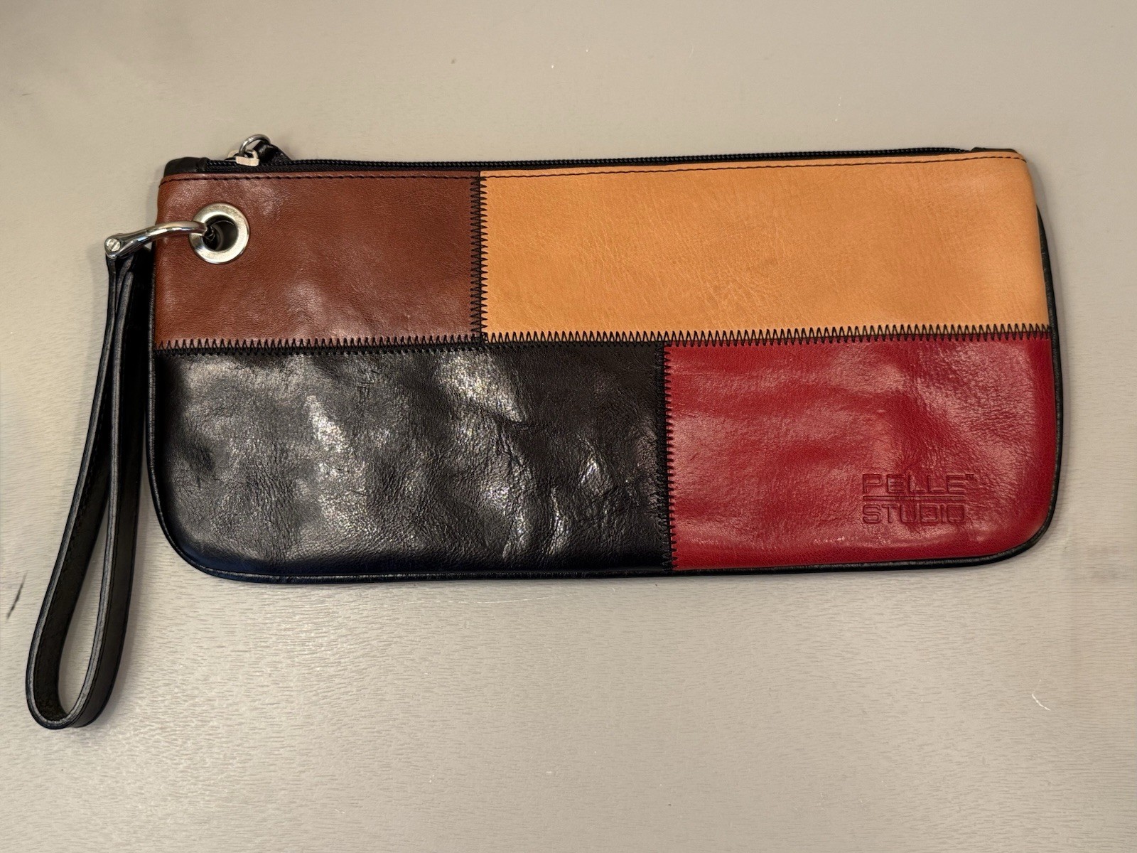 Wilson’s Leather Pelle Studios Multi Color Vintage Clutch