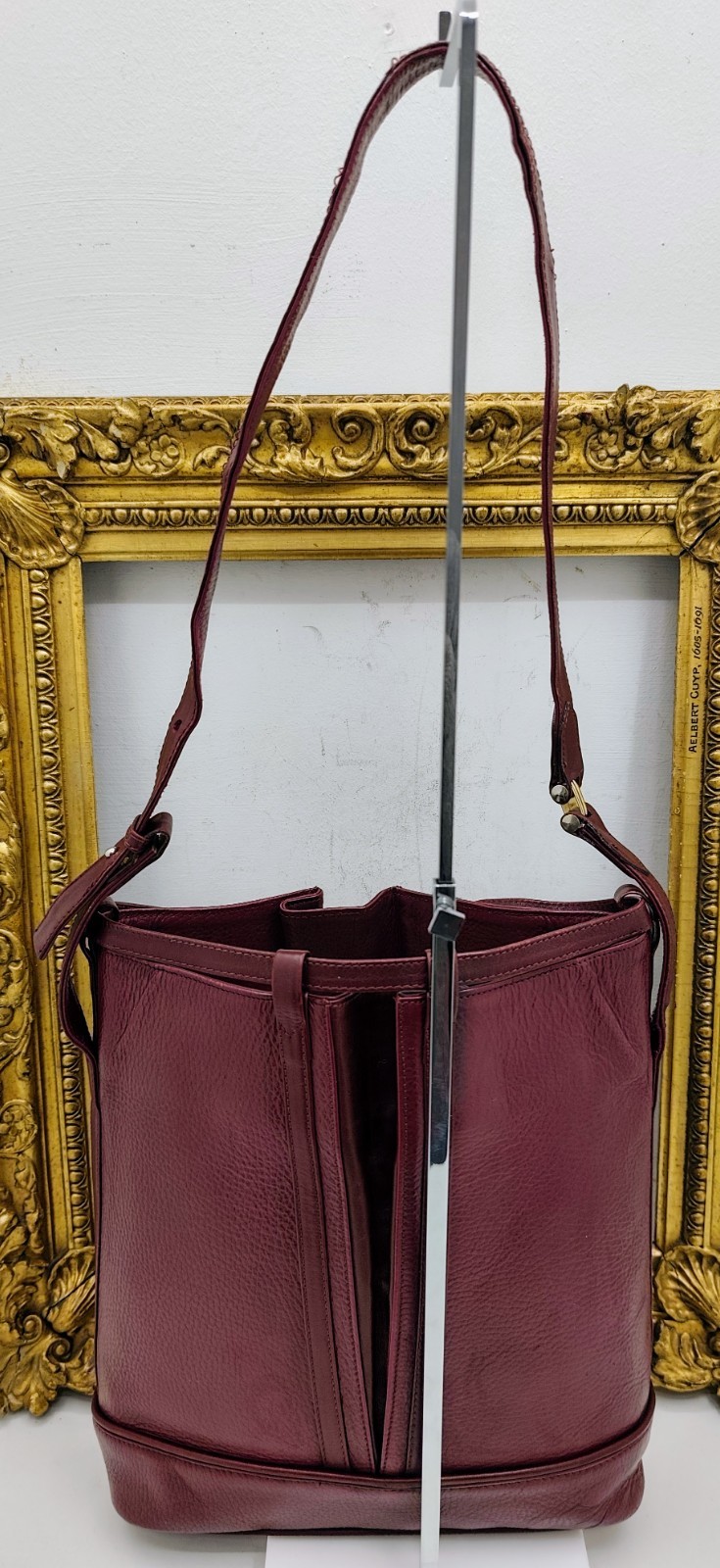 Cartier Oval Bucket Bag With Drawstring In Bordeaux Leather, 30x28x10 cm
