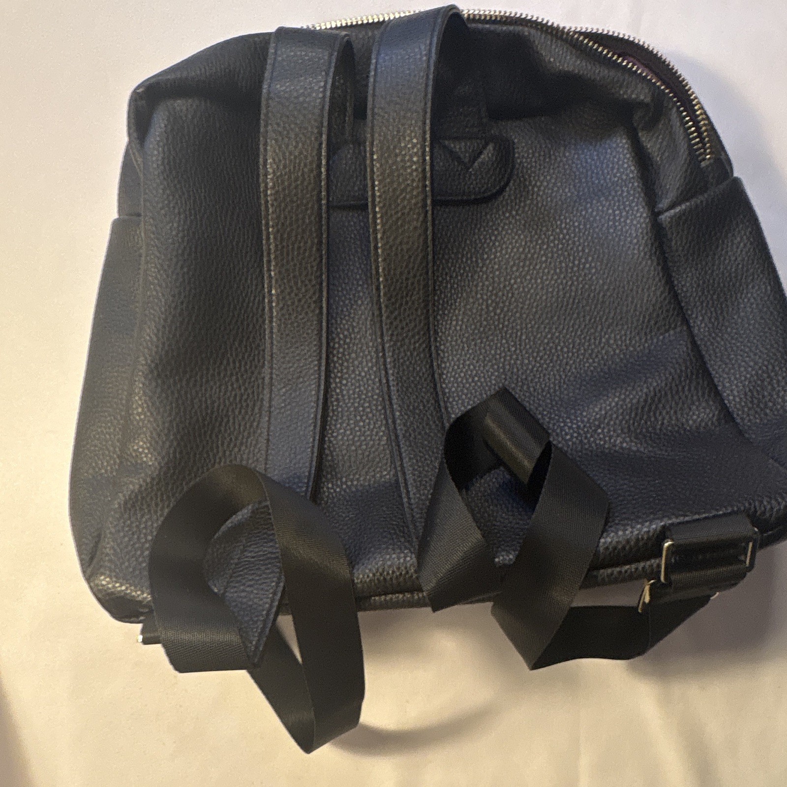 Younique Black Pebbled Backpack with Gold Hardware & Zip, Pockets, Purple Lining