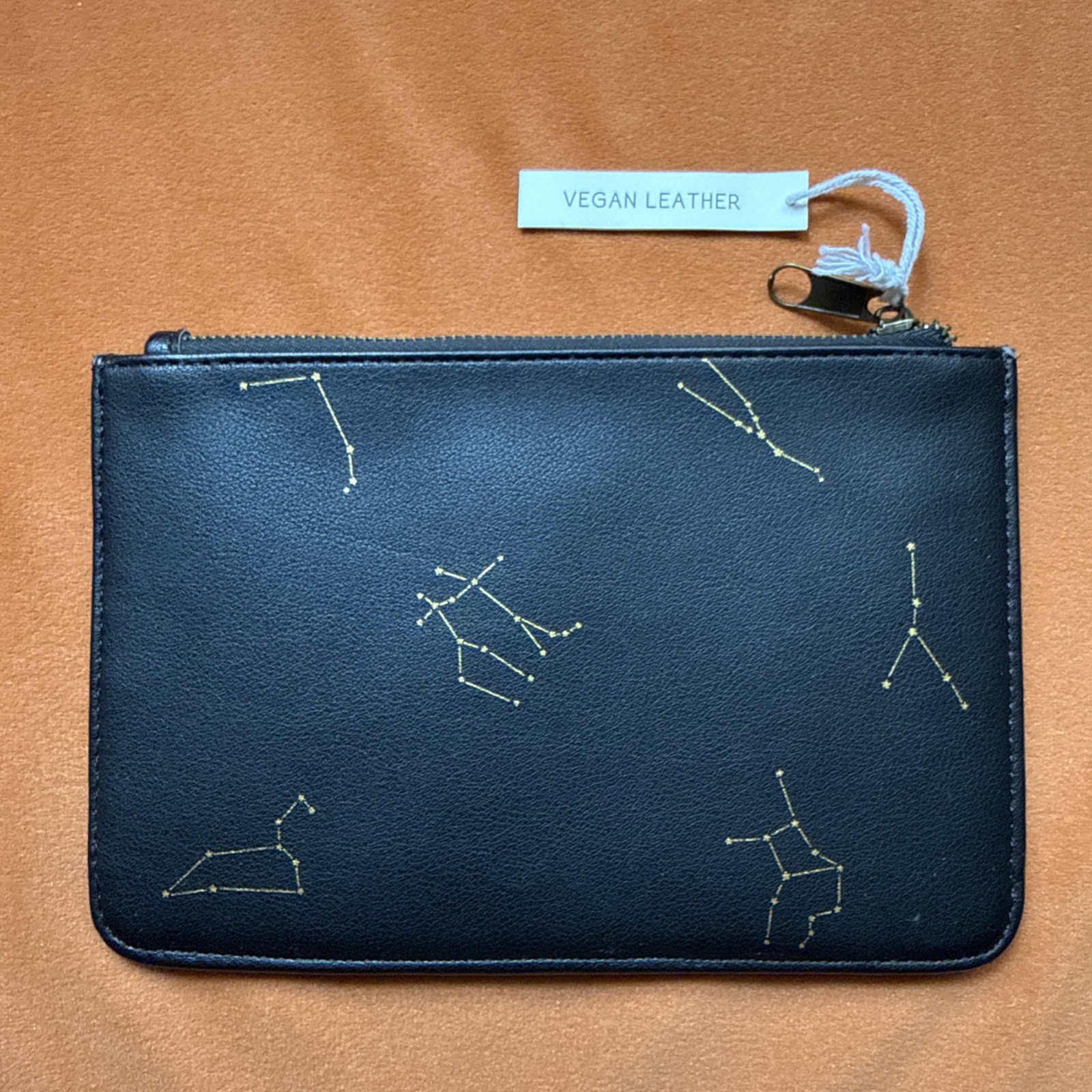 urban outfitters zodiac vegan leather clutch constellation pouch black/gold