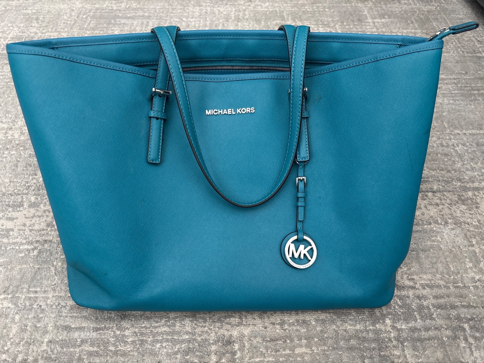 Michael Kors Jet Set Travel Large Top-Zip Tote in a teal/turquoise Saffiano leat