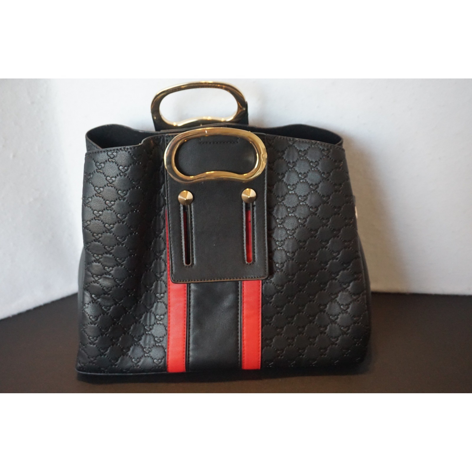 Black Heart Embossed Tote Bag with Red Stripe Gold Cutout Handles Handbag