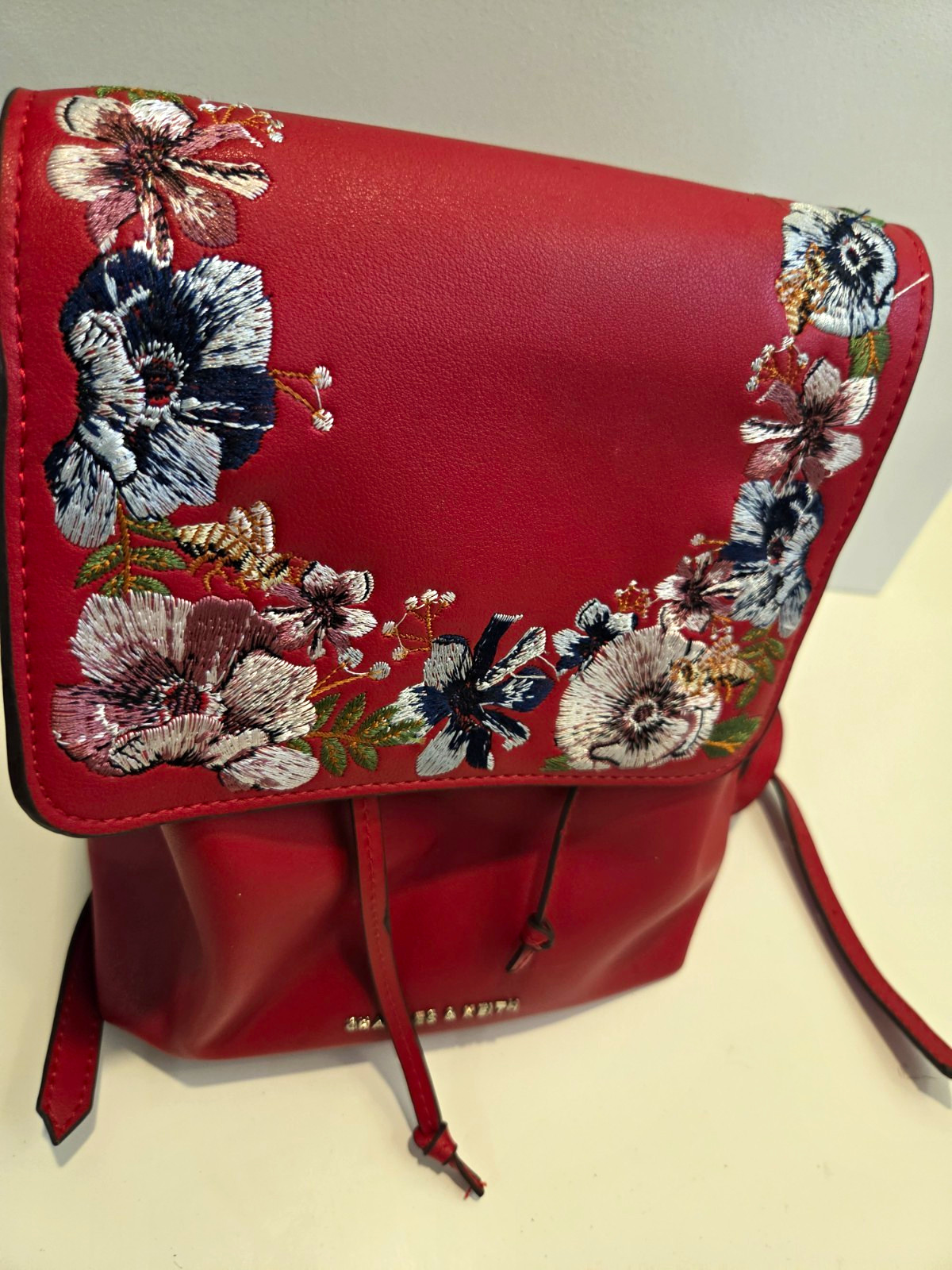 CHARLES & KEITH Women’s Red Floral Embroidered Backpack Drawstring Silver