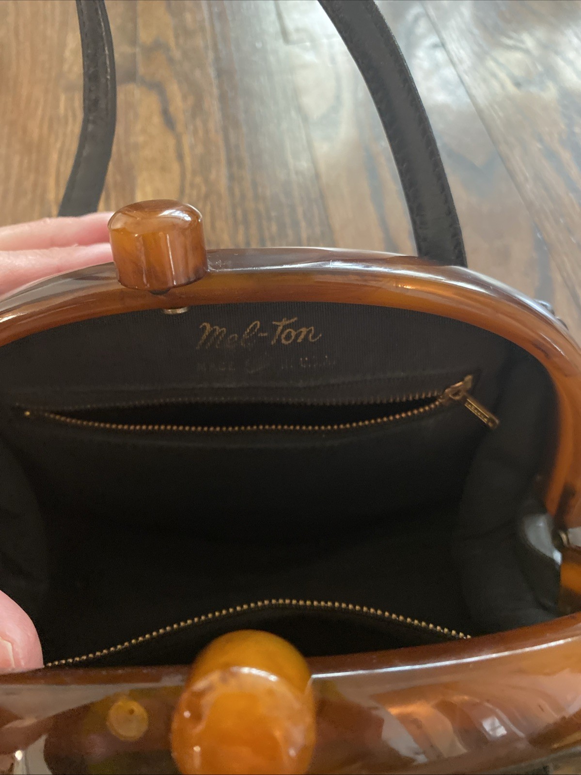 Black Leather Mel Ton Top Handle Bag With Acrylic Closure