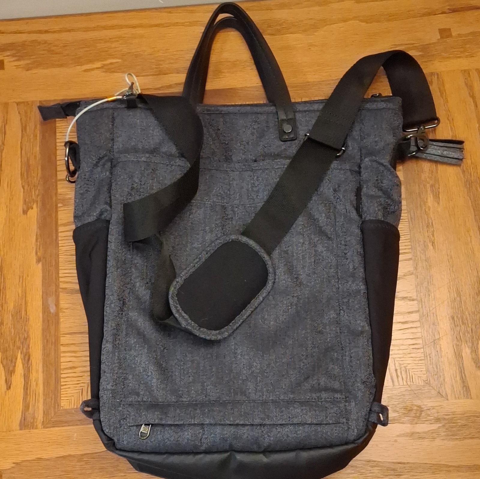Anti-Theft Convertible Tote, Crossbody, and Backpack, And Water Bottle Holders.
