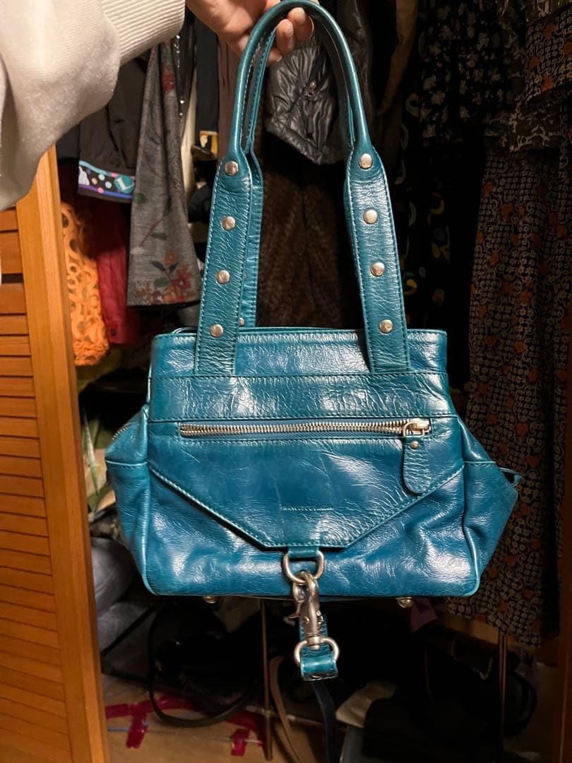 FRANCESCO BIASIA peacock color leather handbag in excellent condition
