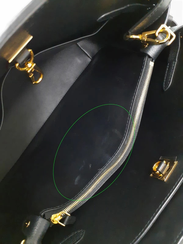 Louis Vuitton Milla bag black pebbled Veau Nuage leather