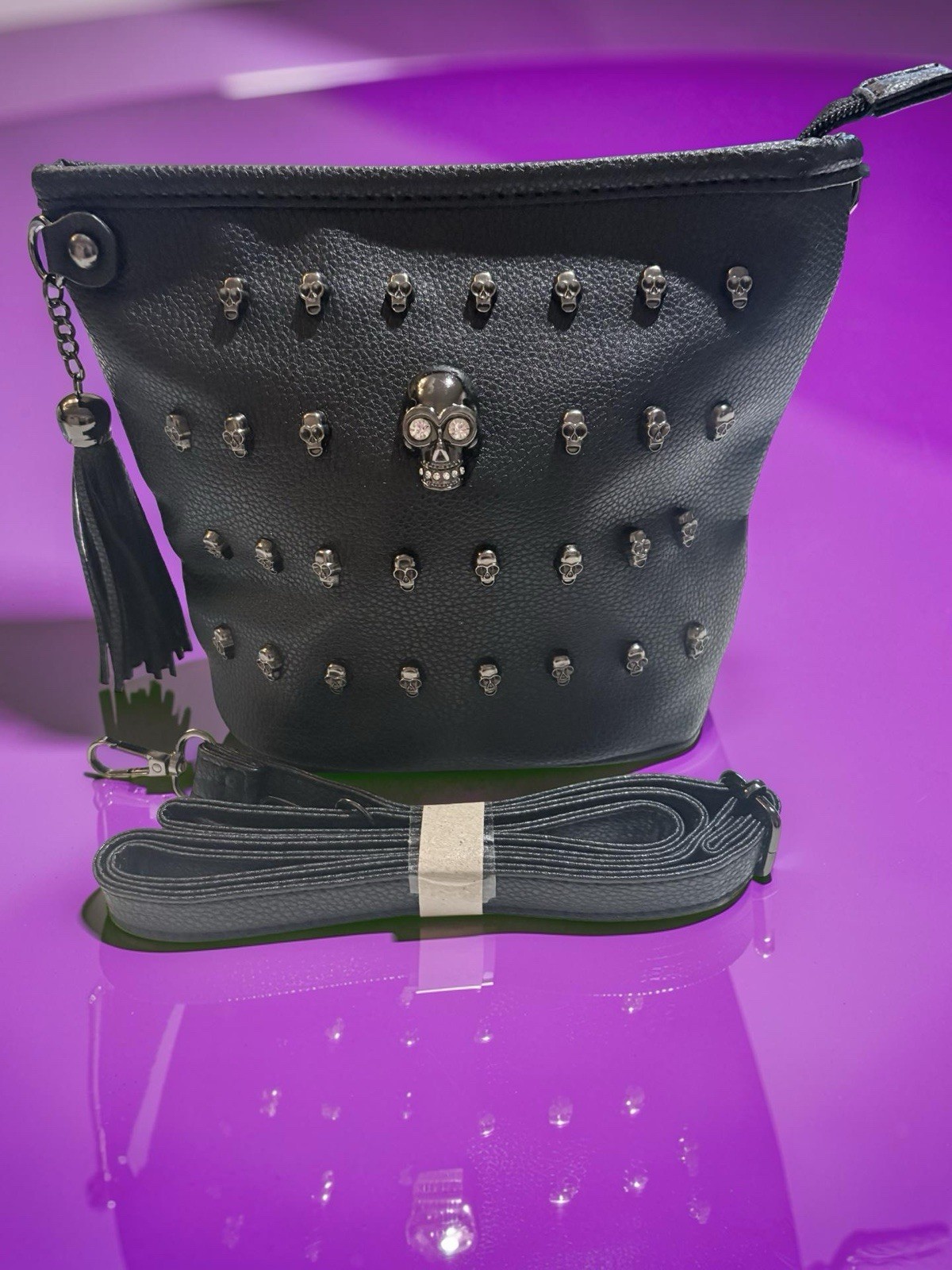 Skull studded bucket style purse pleather bag with shoulder strap