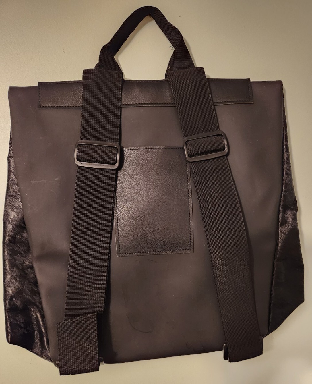 Tanger black houndstooth patterned backpack, looks new!